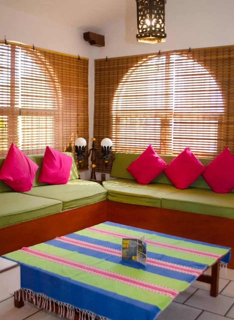 Bed, Seating Area in Hotel Casa Alvarada