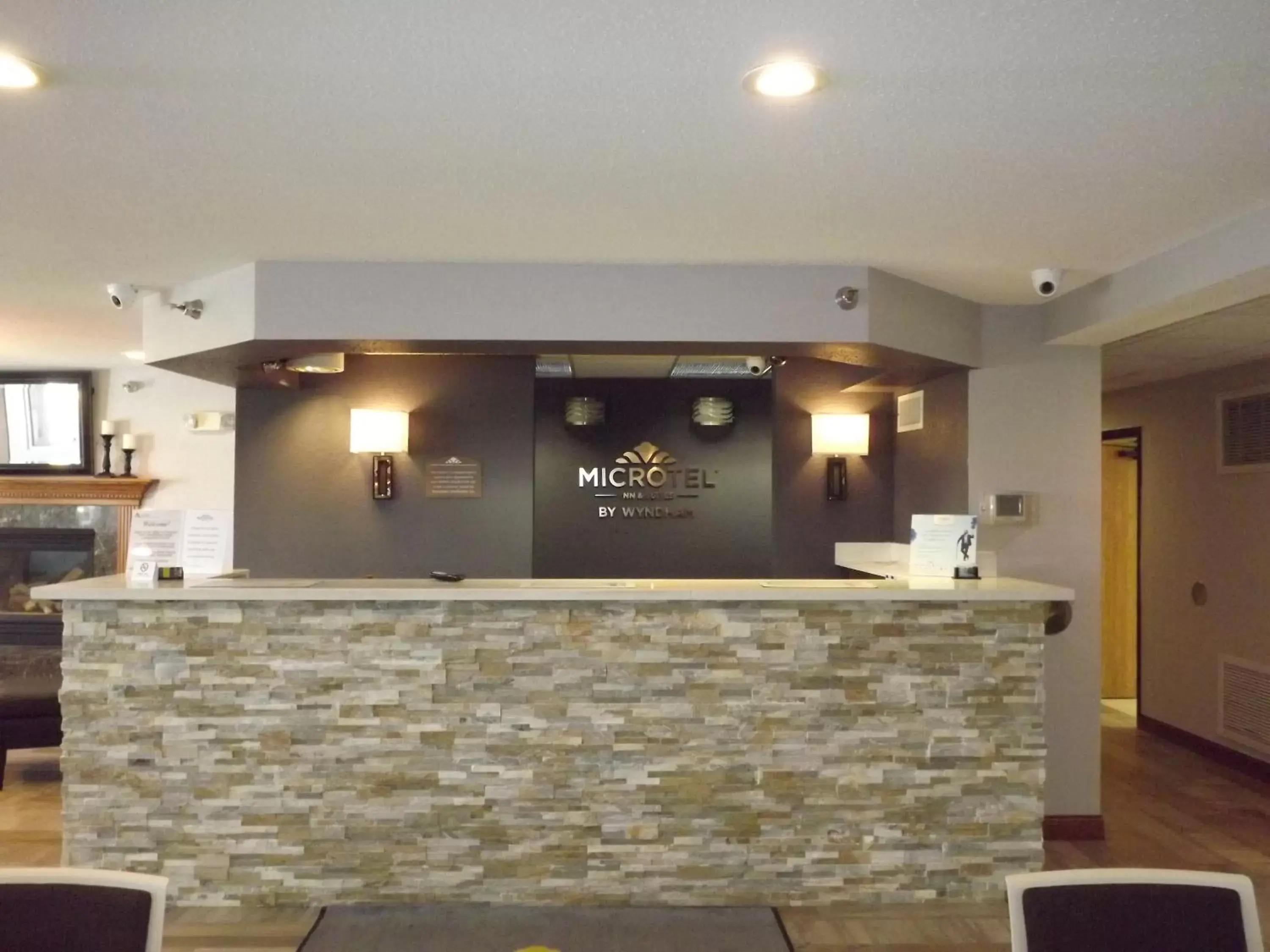 Property logo or sign, Lobby/Reception in MICROTEL Inn and Suites - Ames