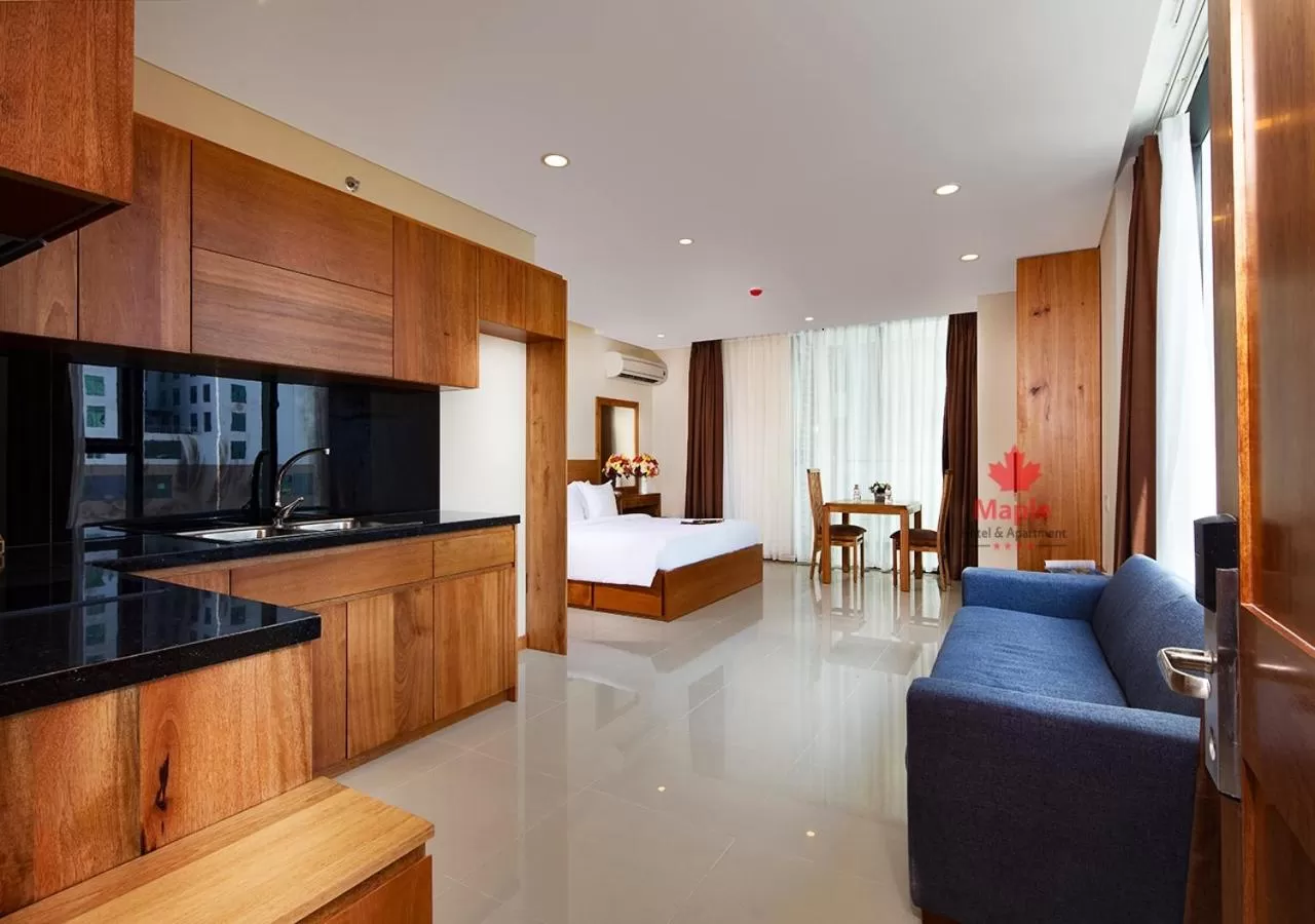 Kitchen or kitchenette in Maple Hotel & Apartment