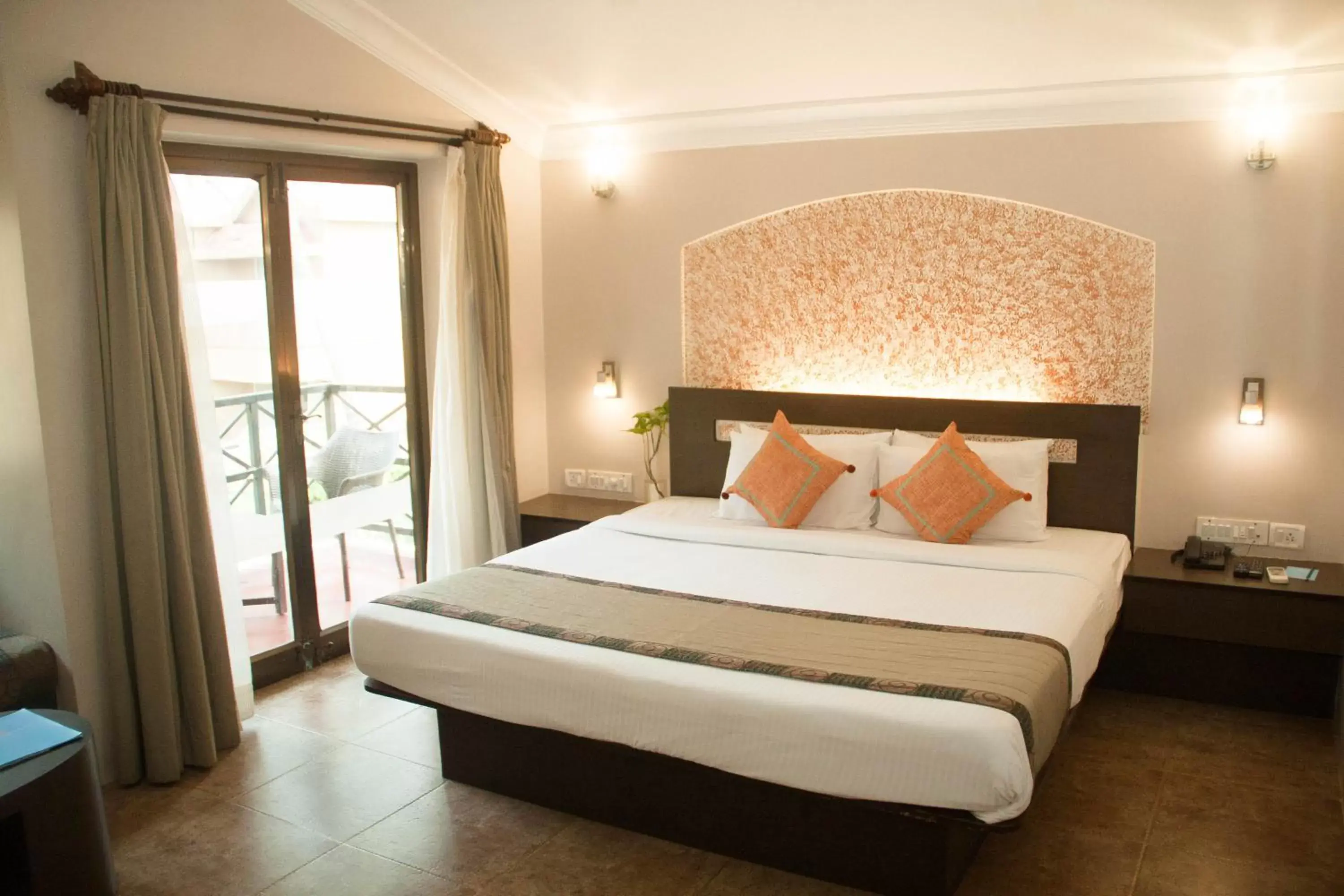 Balcony/Terrace, Bed in Whispering Palms Beach Resort