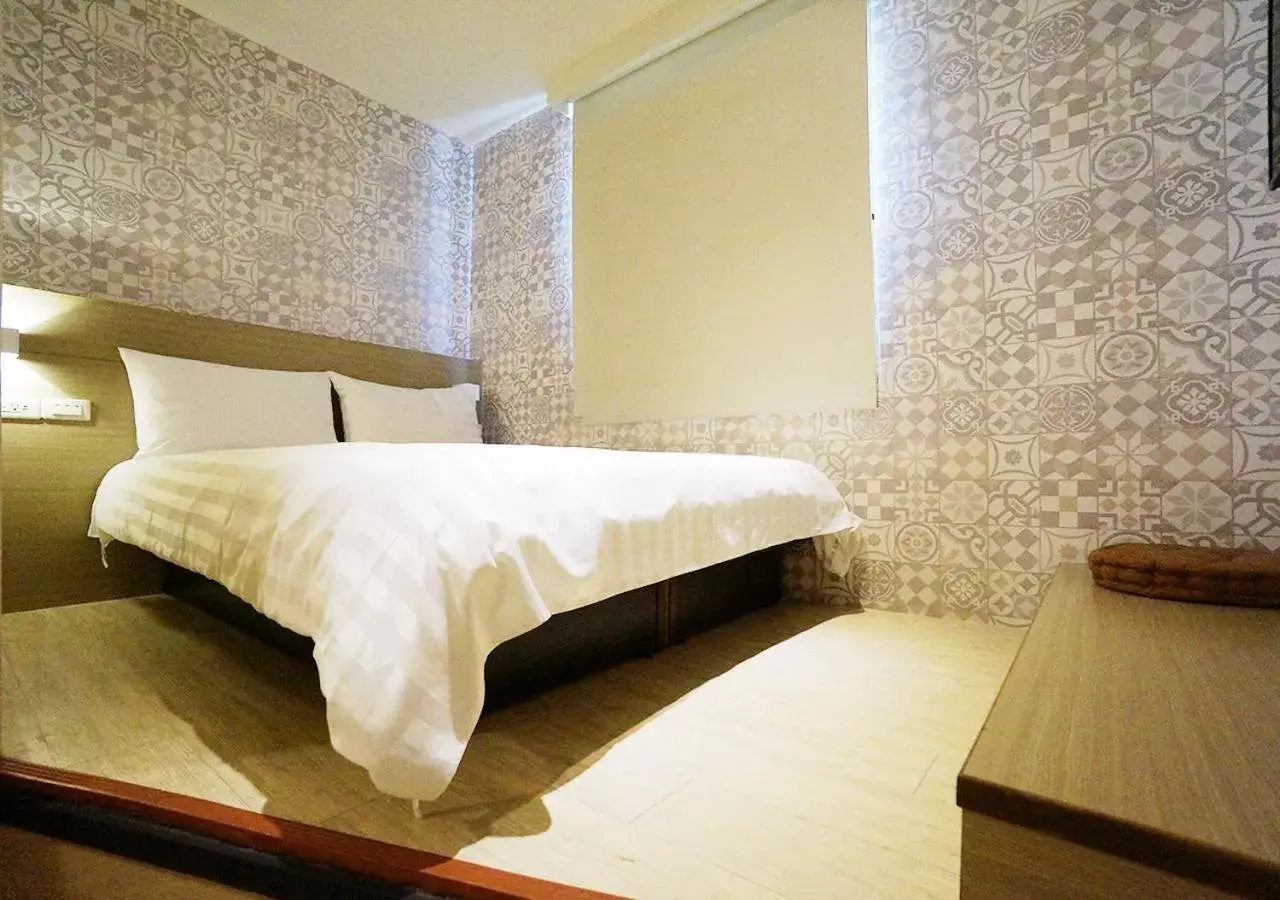 Bed in Win Inn Kaohsiung Hotel