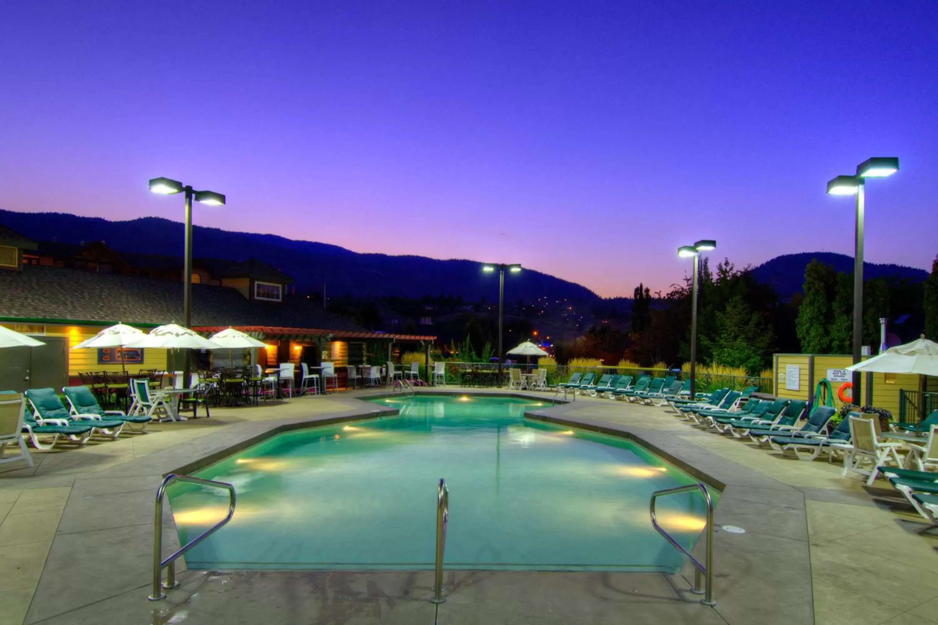 Patio, Swimming Pool in Ramada by Wyndham Penticton Hotel & Suites