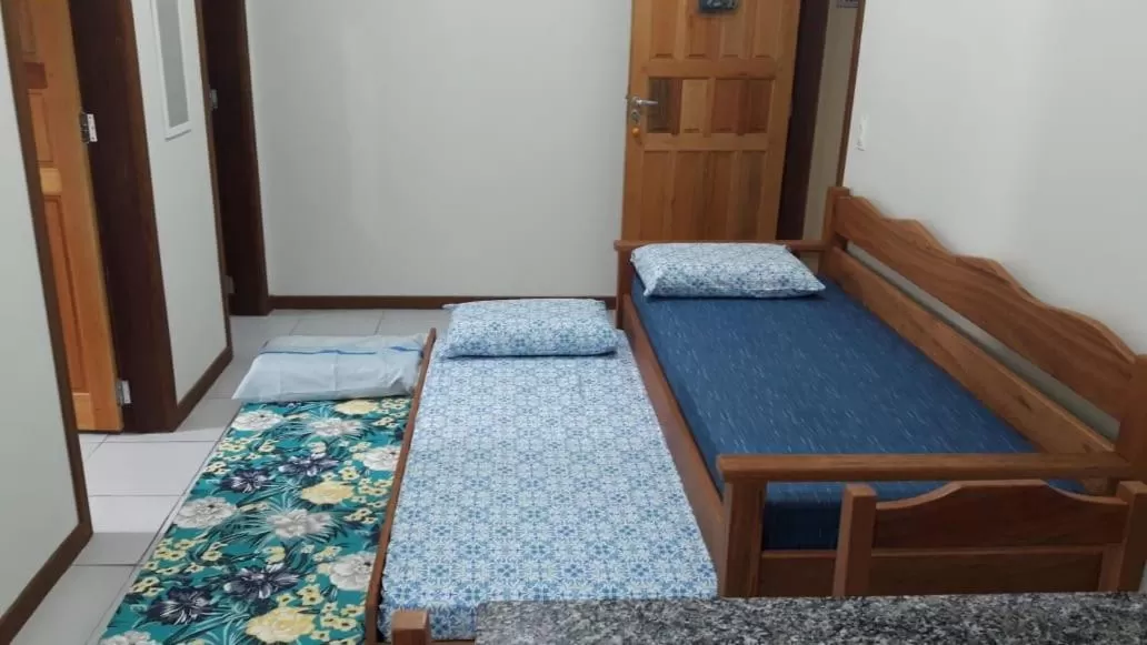 Bed in Pousada Pegadas na Areia