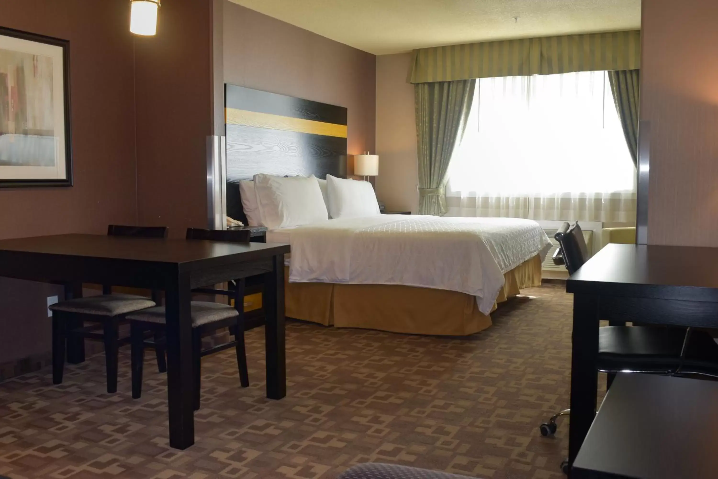 Bedroom, Bed in Holiday Inn Express and Suites Dawson Creek, an IHG Hotel