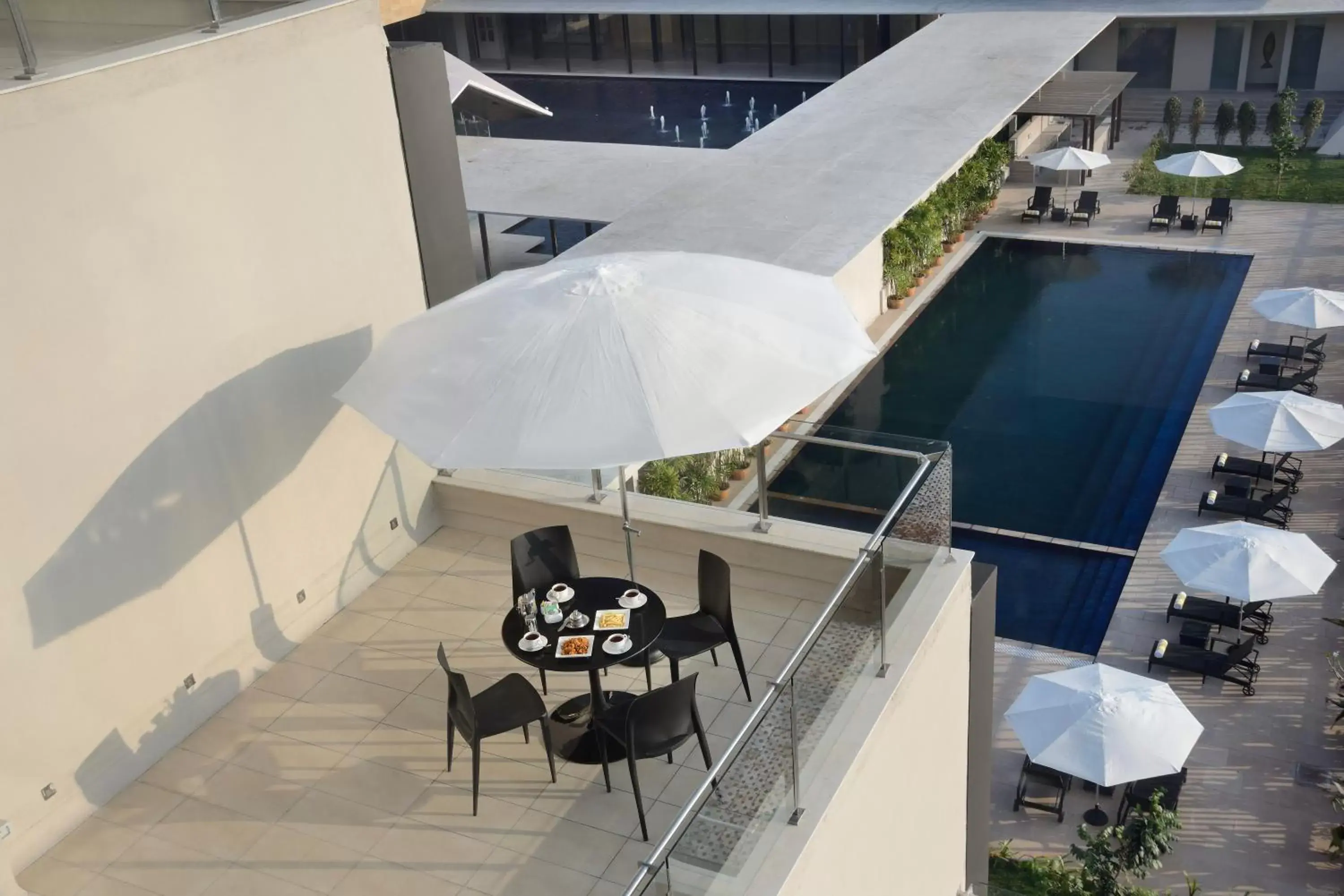 Balcony/Terrace, Pool View in Marasa Sarovar Premiere