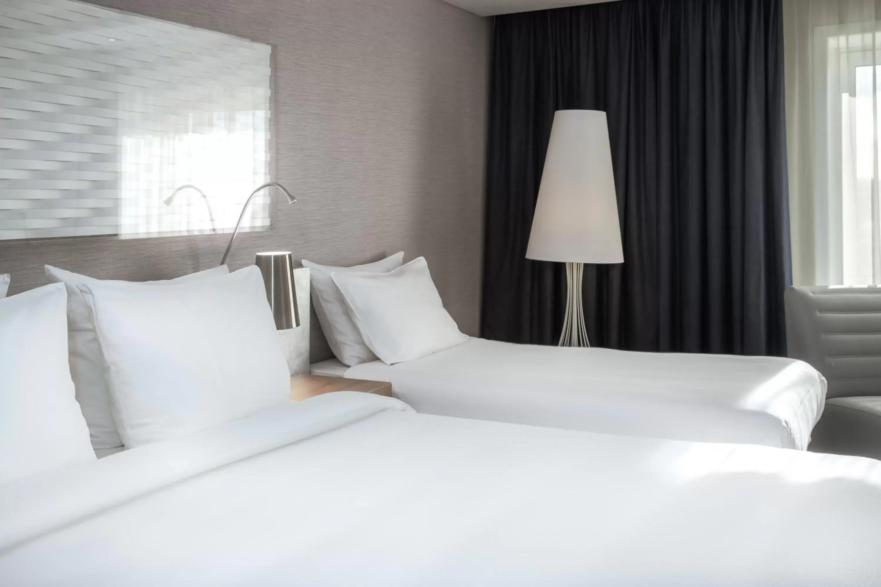 Bed in Radisson Blu Scandinavia Hotel Aarhus