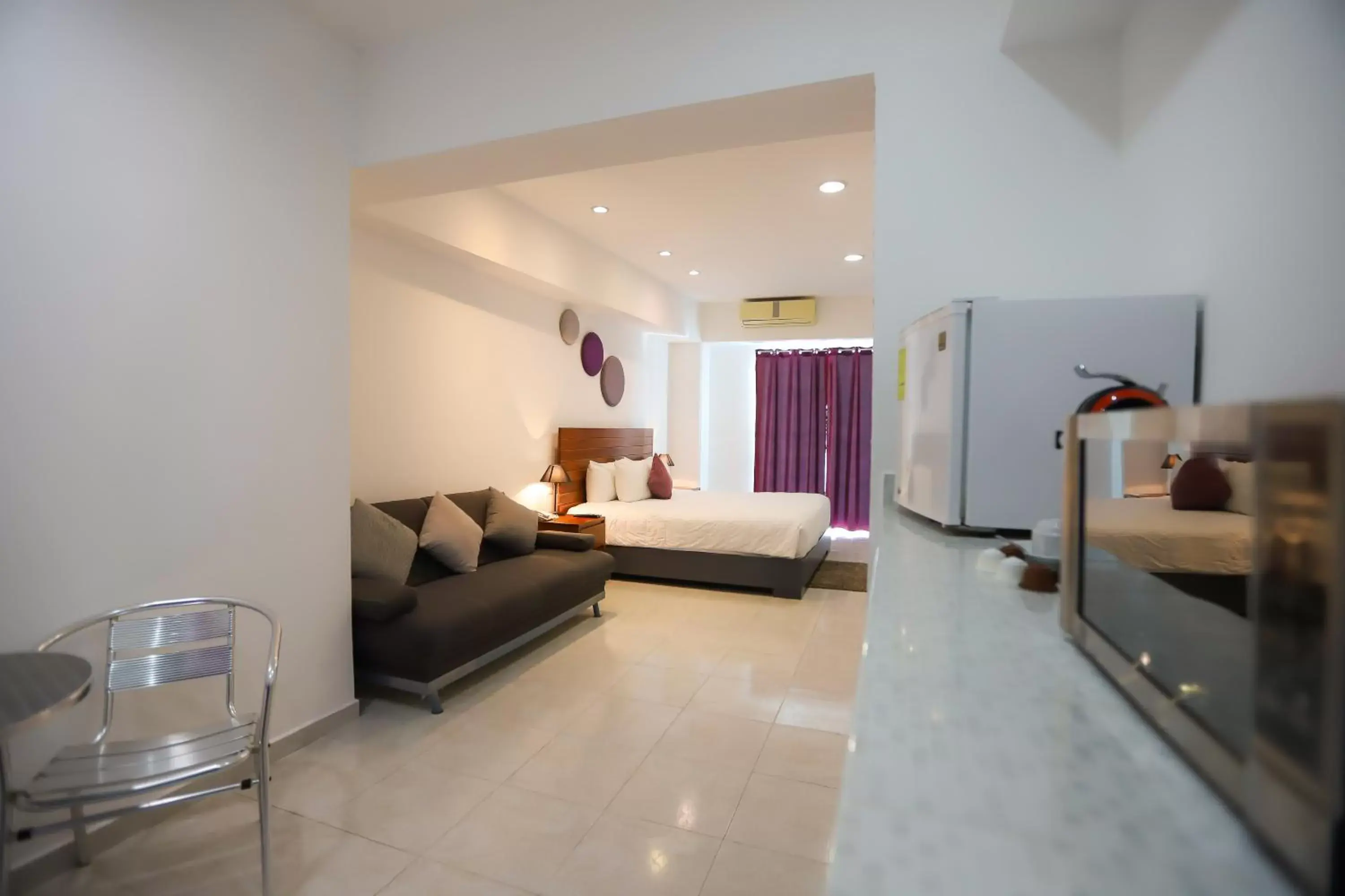 Bed in TRYP by Wyndham Chetumal