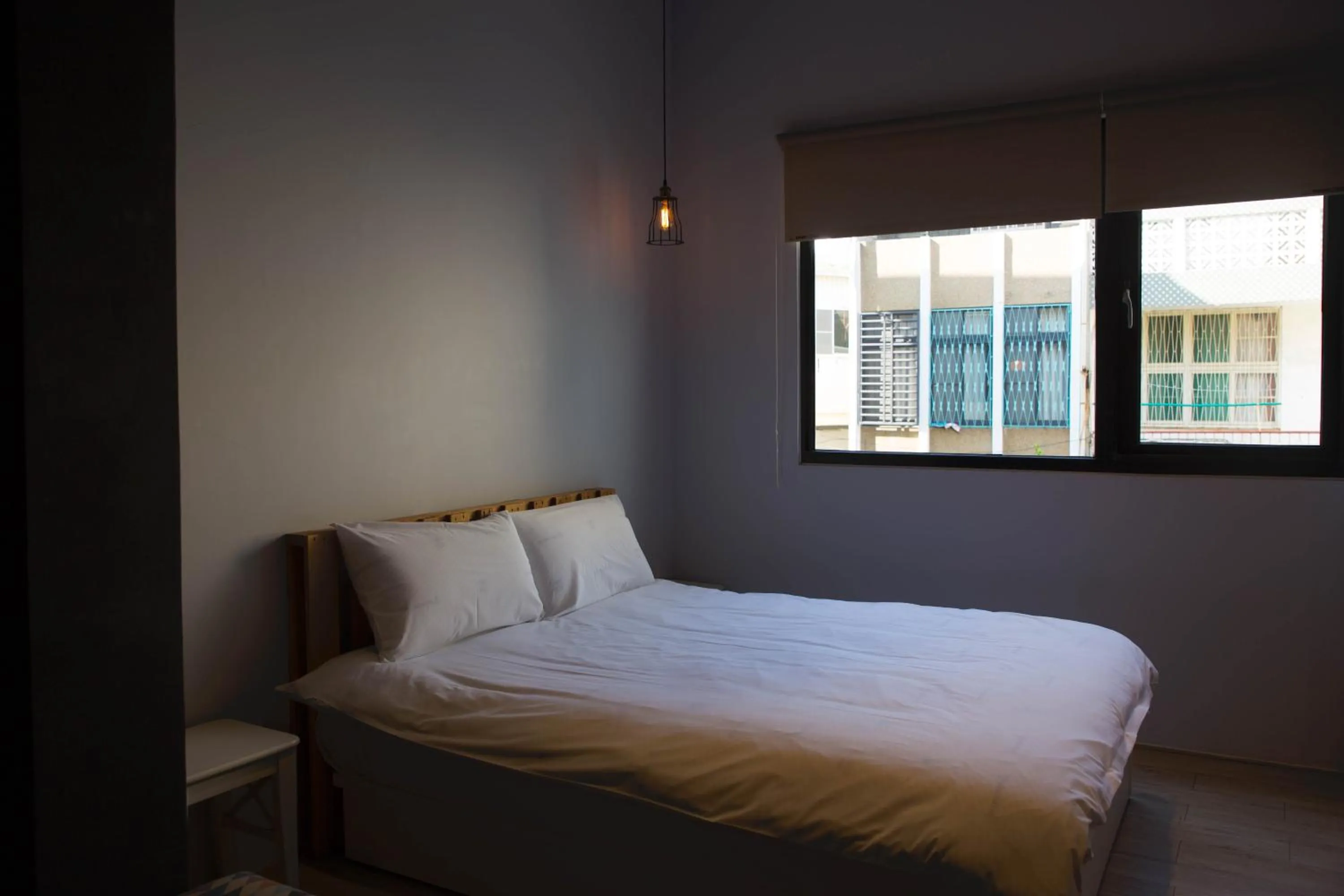 Bed in 被愛咖啡小旅館 Birdeye Garden