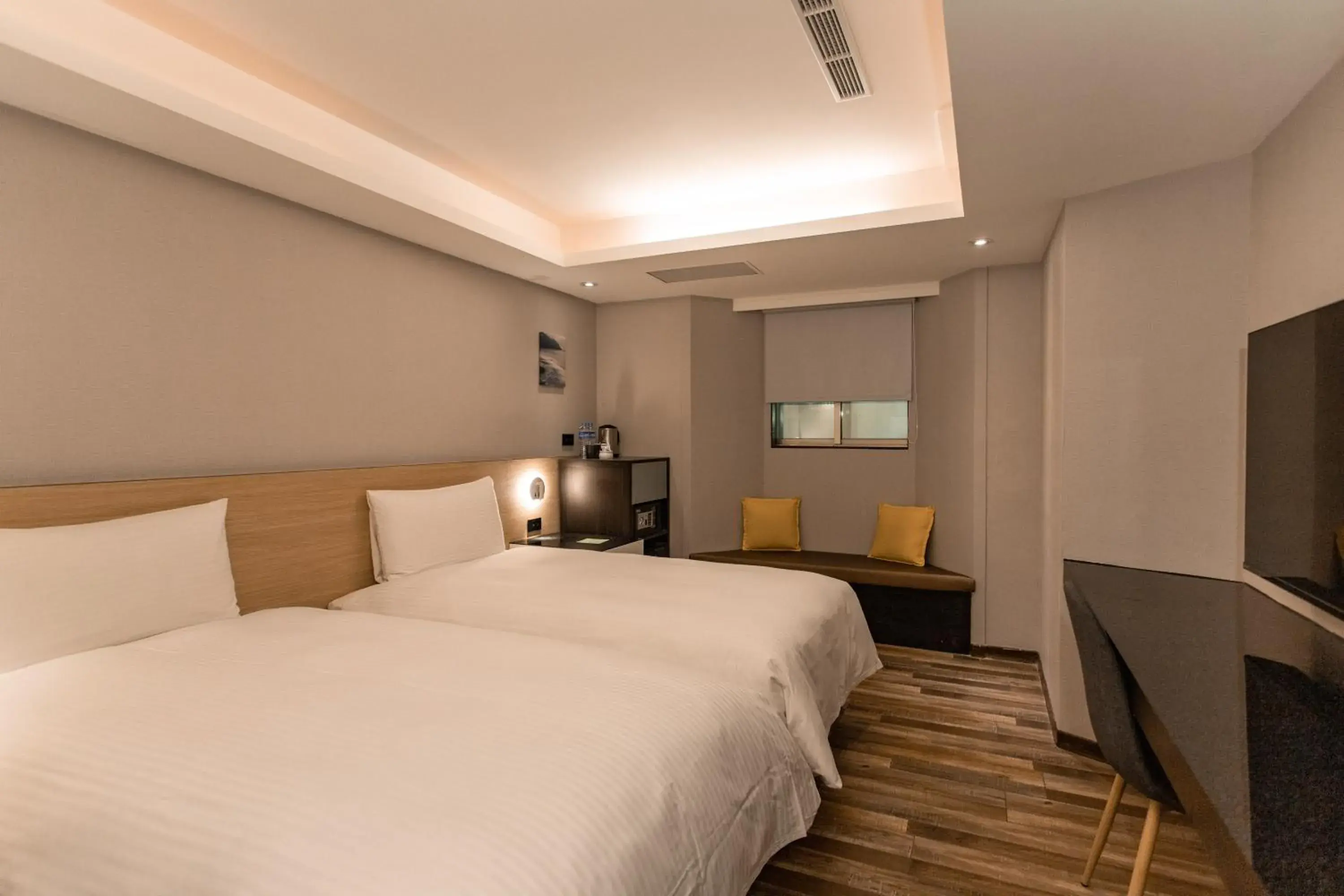 Bed in Hub Hotel Tucheng