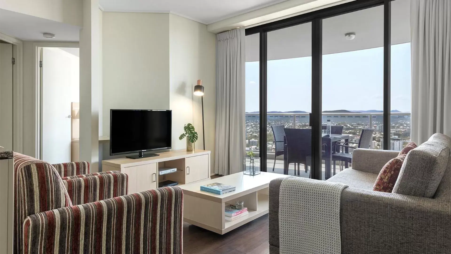 TV and multimedia, Seating Area in Oaks Brisbane Aurora Suites