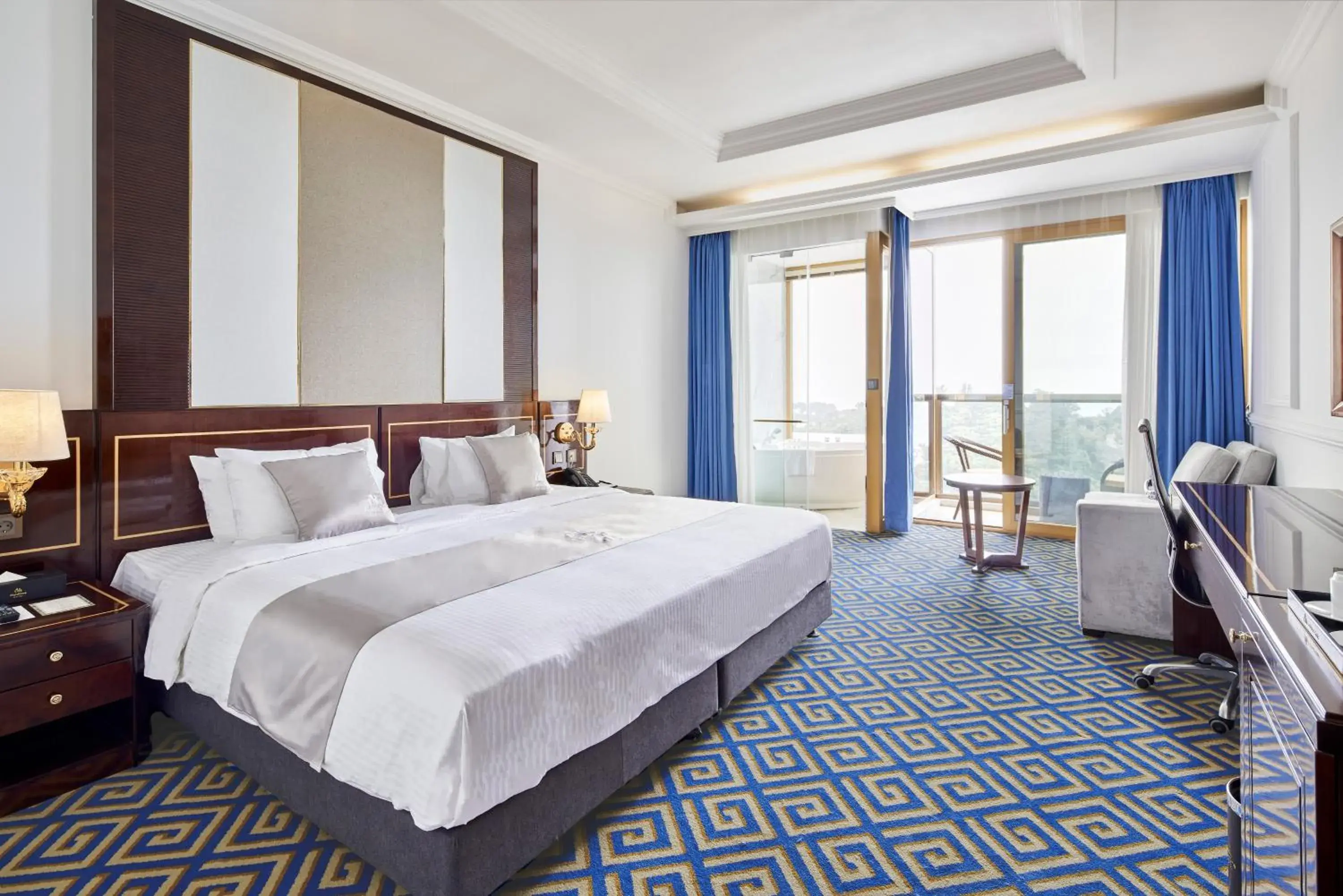 Bed in GoldOne Hotel & Suites Bed in GoldOne Hotel & Suites