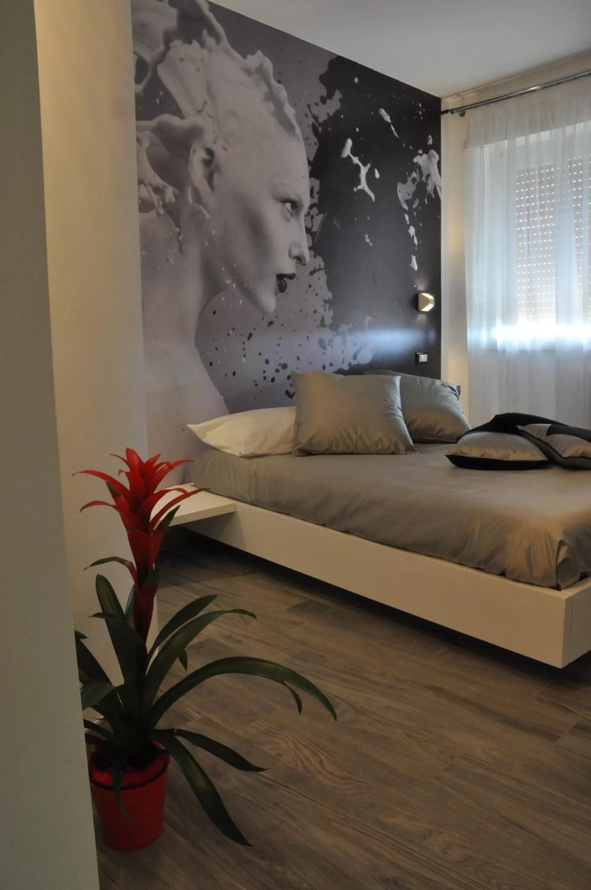 Photo of the whole room, Bed in Caos Calmo