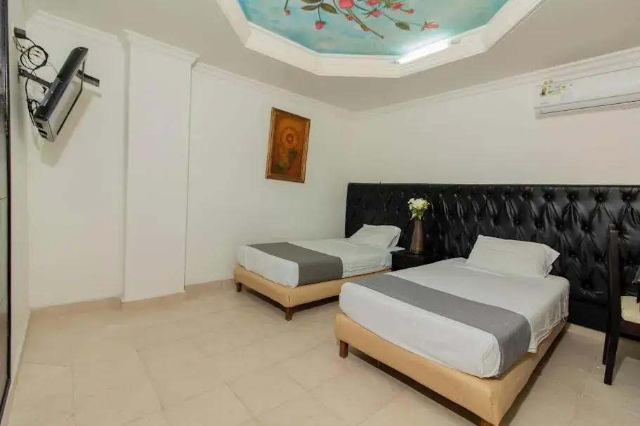 TV and multimedia, Bed in Hotel Caribe Princess by Cyan