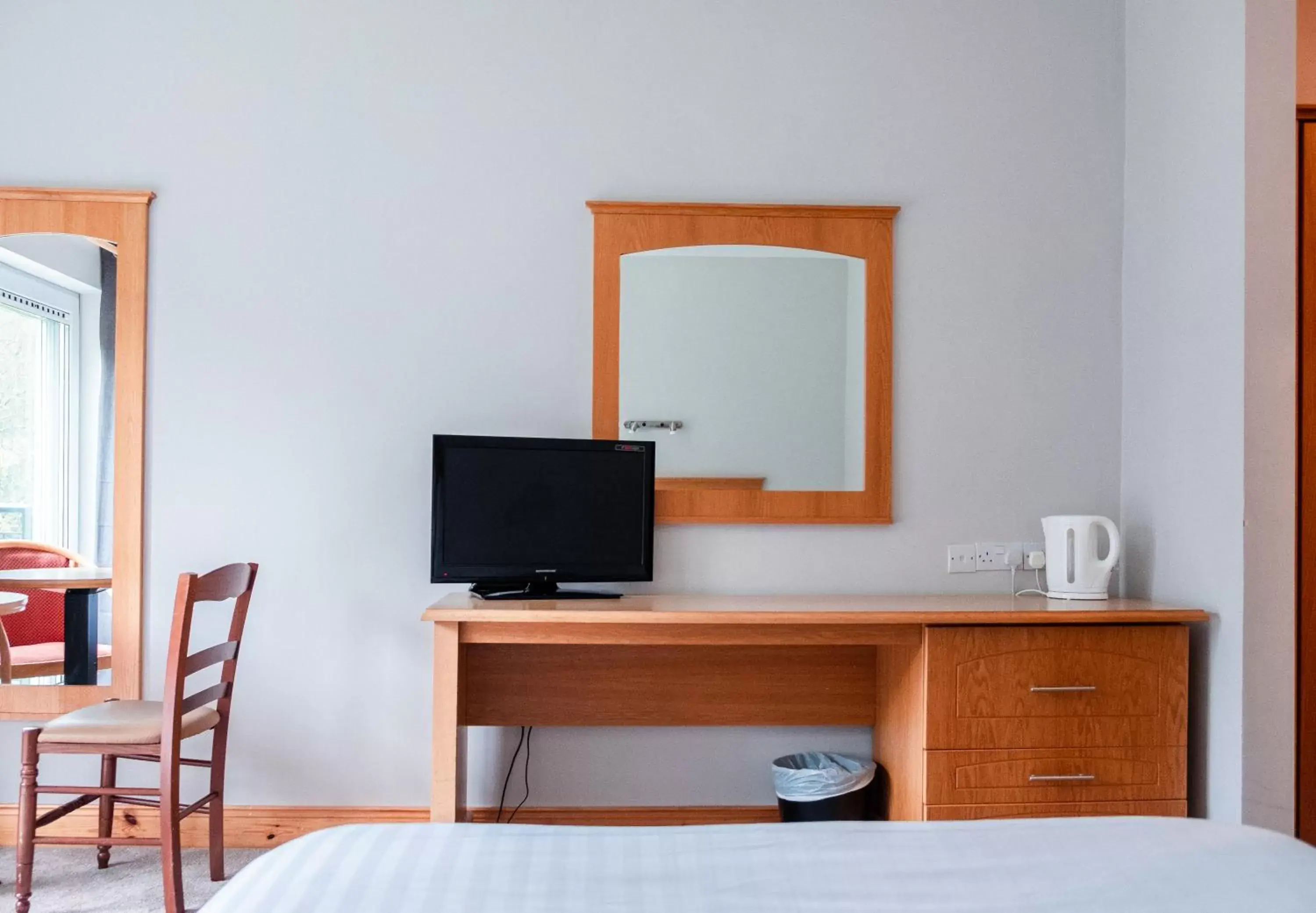 Bedroom, TV/Entertainment Center in The Lodge at Woodenbridge