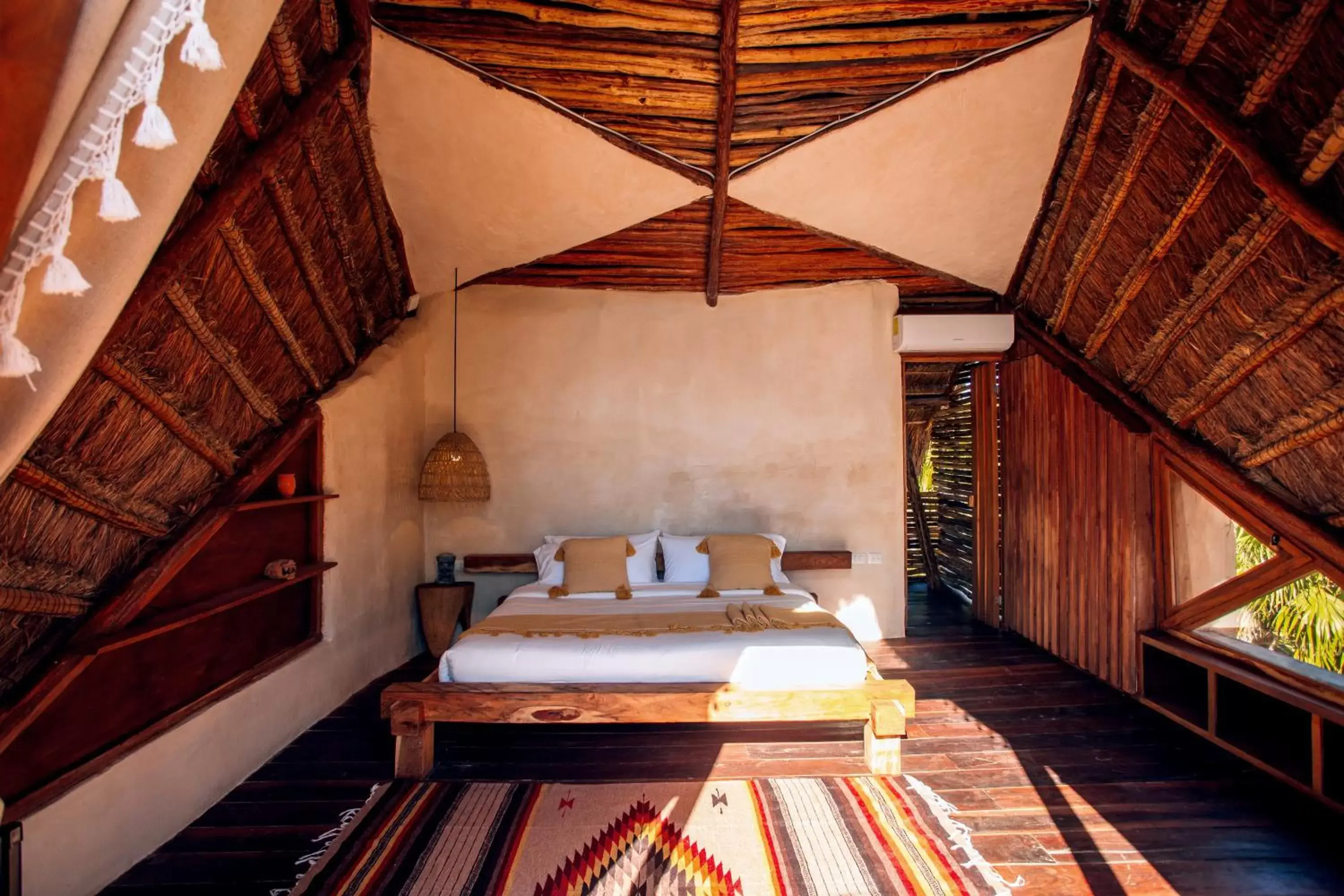 Photo of the whole room, Bed in Ikal Tulum Hotel