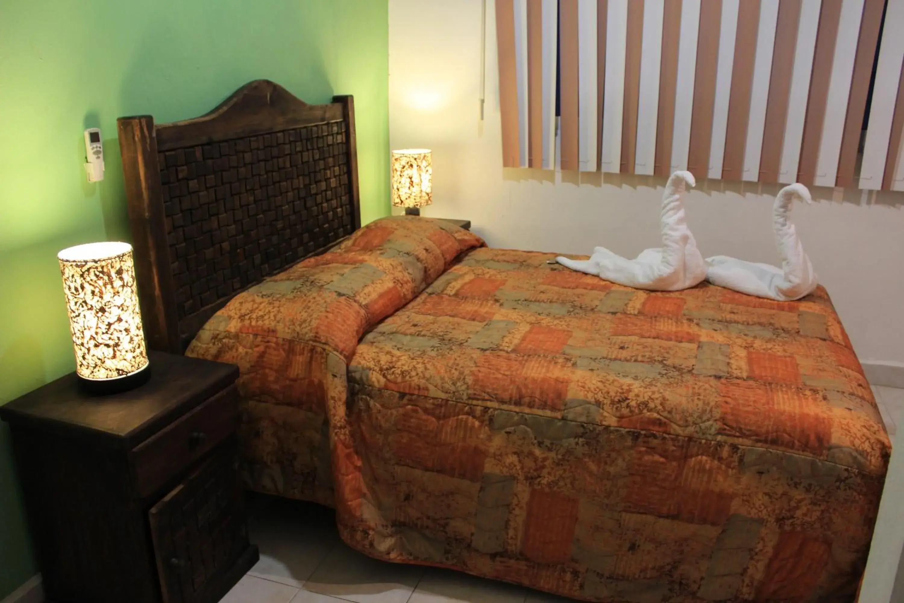 Decorative detail, Bed in Terracota Corner Rooms