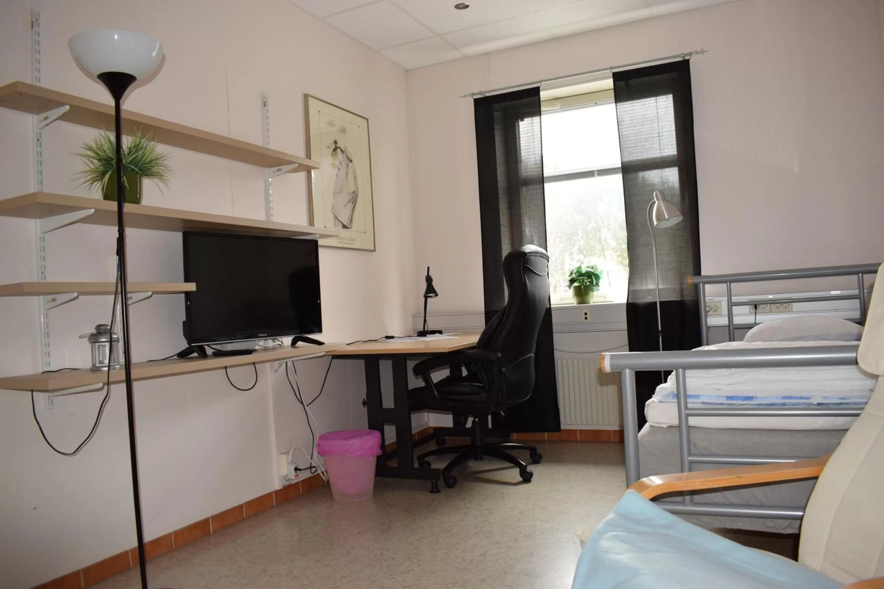 Photo of the whole room, TV/Entertainment Center in Vallabiten Rum och Lägenheter