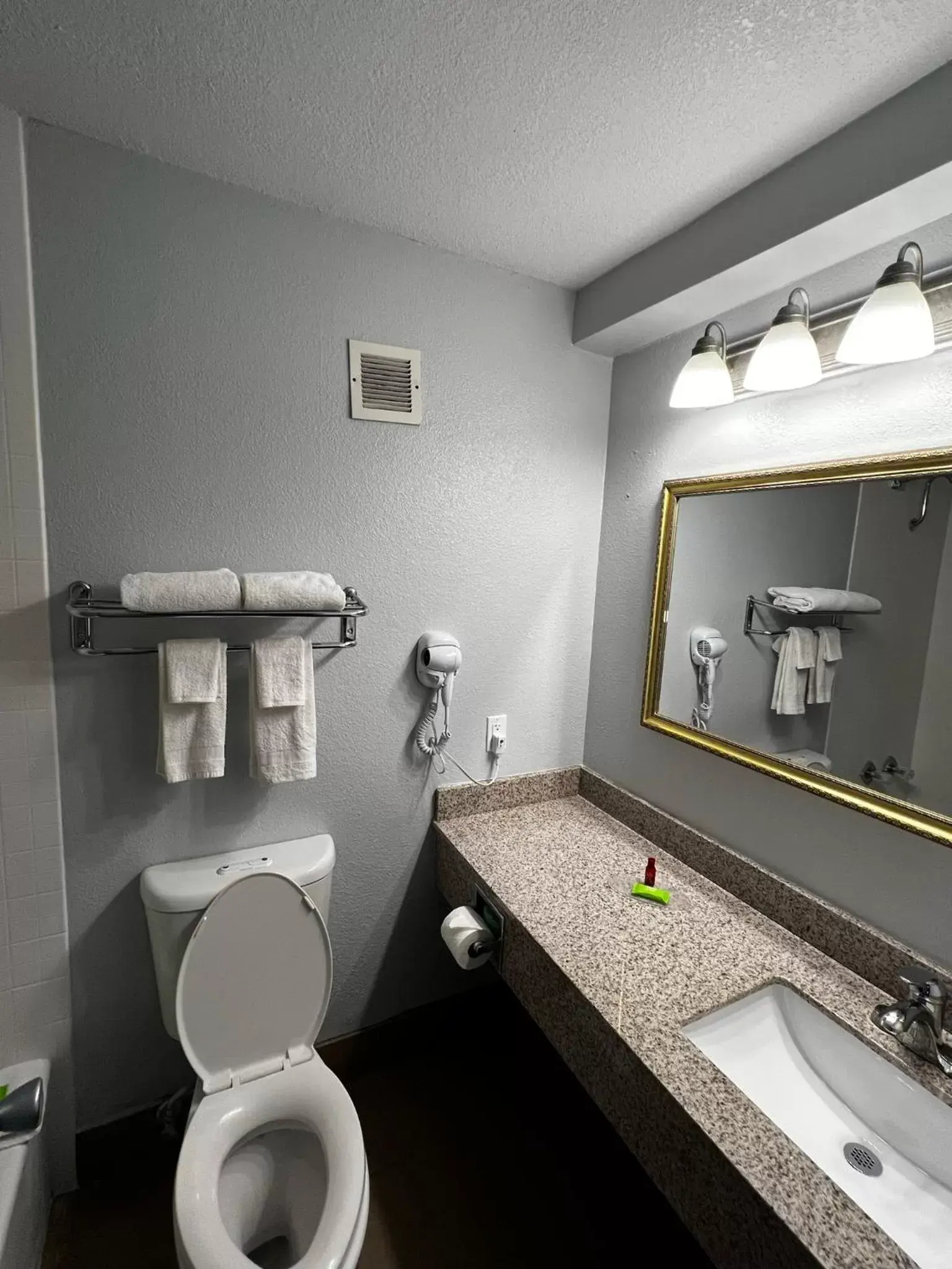 Bathroom in Super 8 by Wyndham Fort Worth Entertainment District