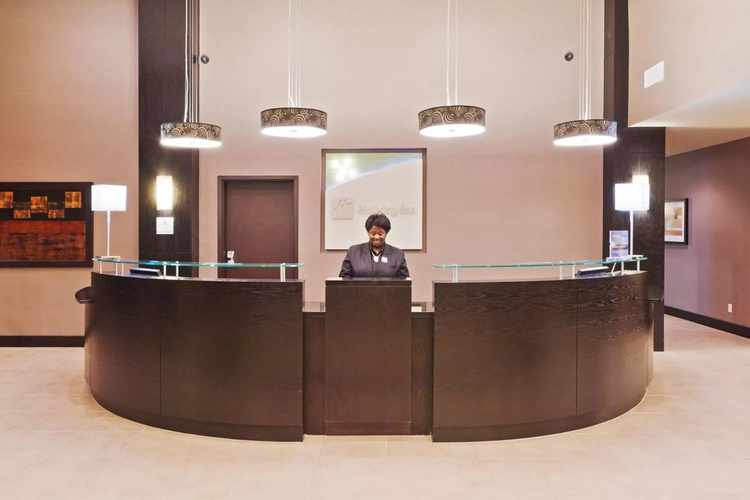 Property building, Staff in Holiday Inn Hotel & Suites Tulsa South, an IHG Hotel