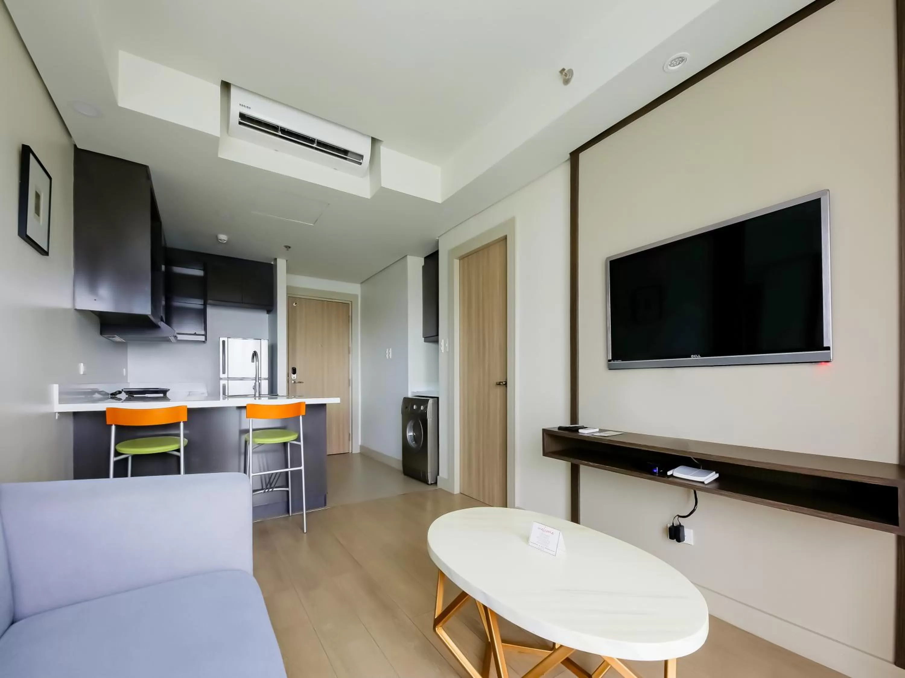 Living room, TV/Entertainment Center in Capital O 804 The Residences at Bonifacio Civic Center