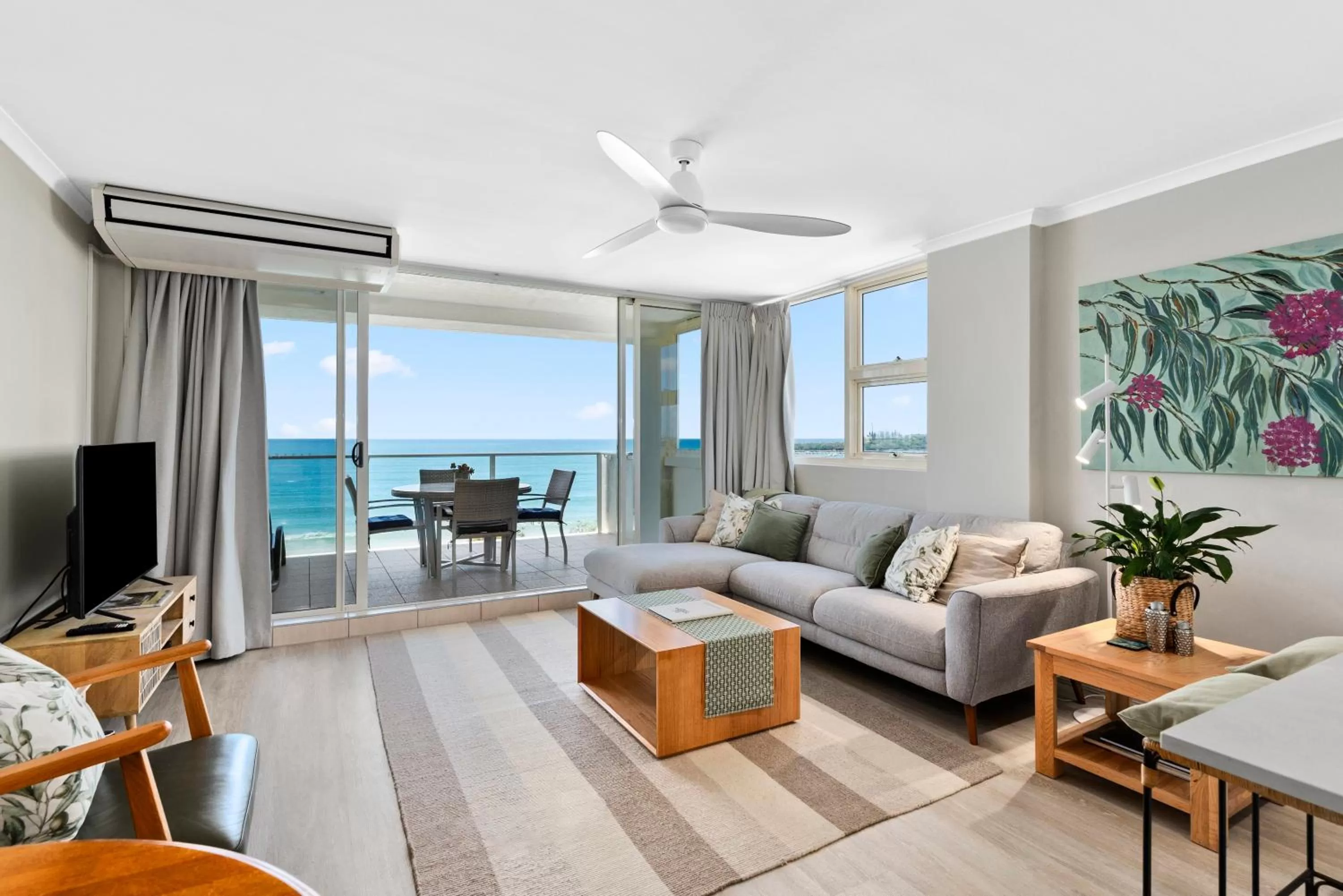 Living room in 84 The Spit Holiday Apartments