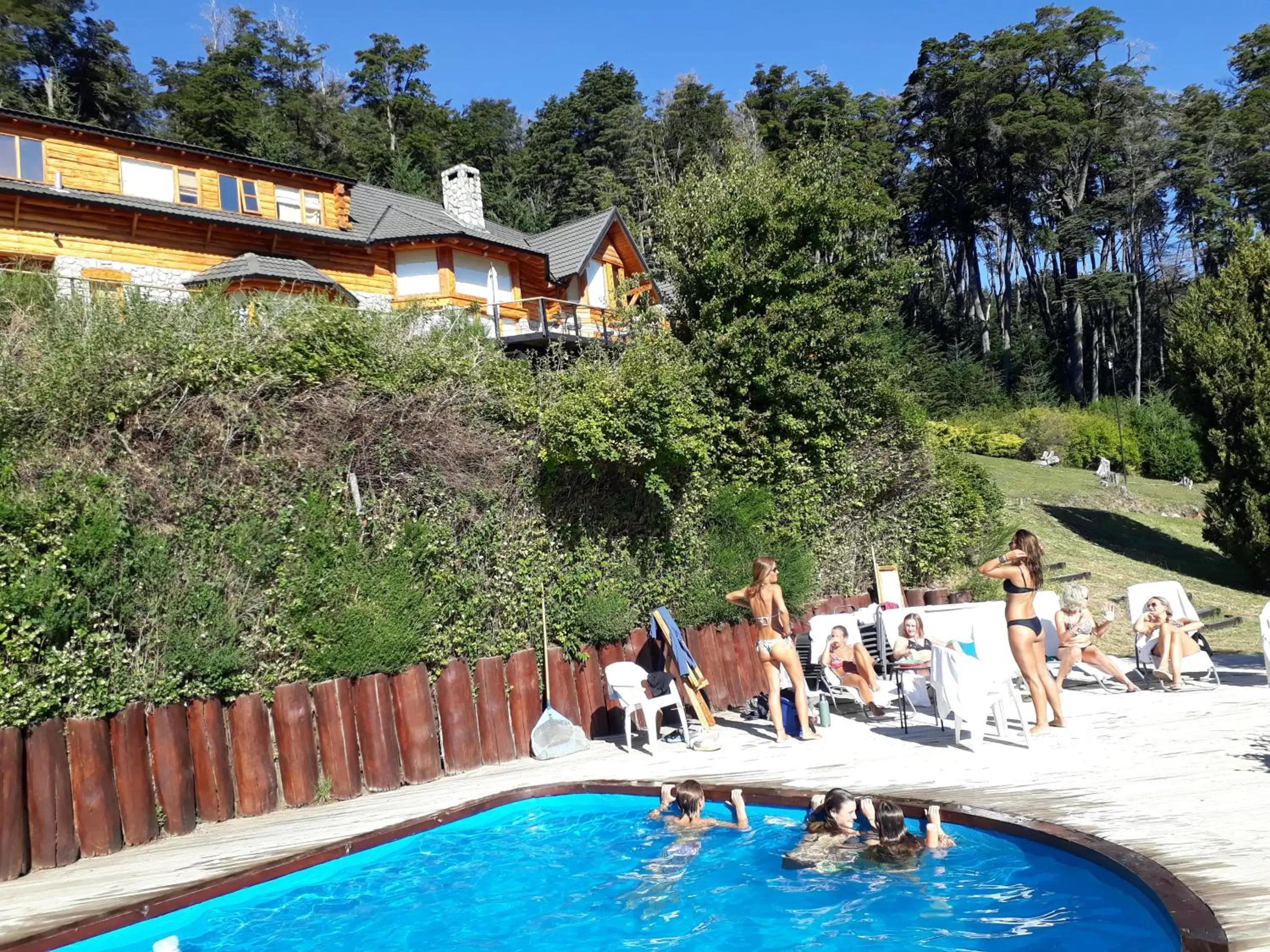 Communal lounge/ TV room, Swimming Pool in Amigos del Bosque Communal lounge/ TV room, Swimming Pool in Amigos del Bosque