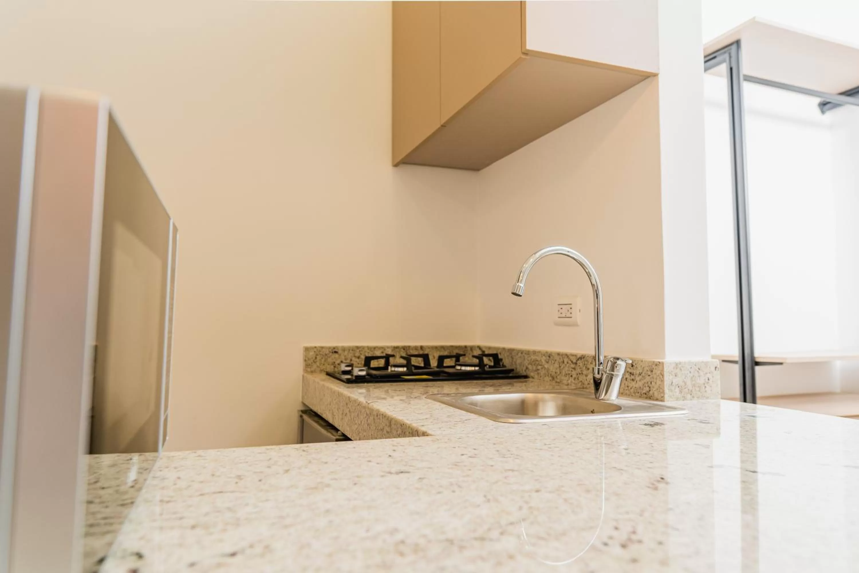 Kitchen or kitchenette in Del Mar Guest House