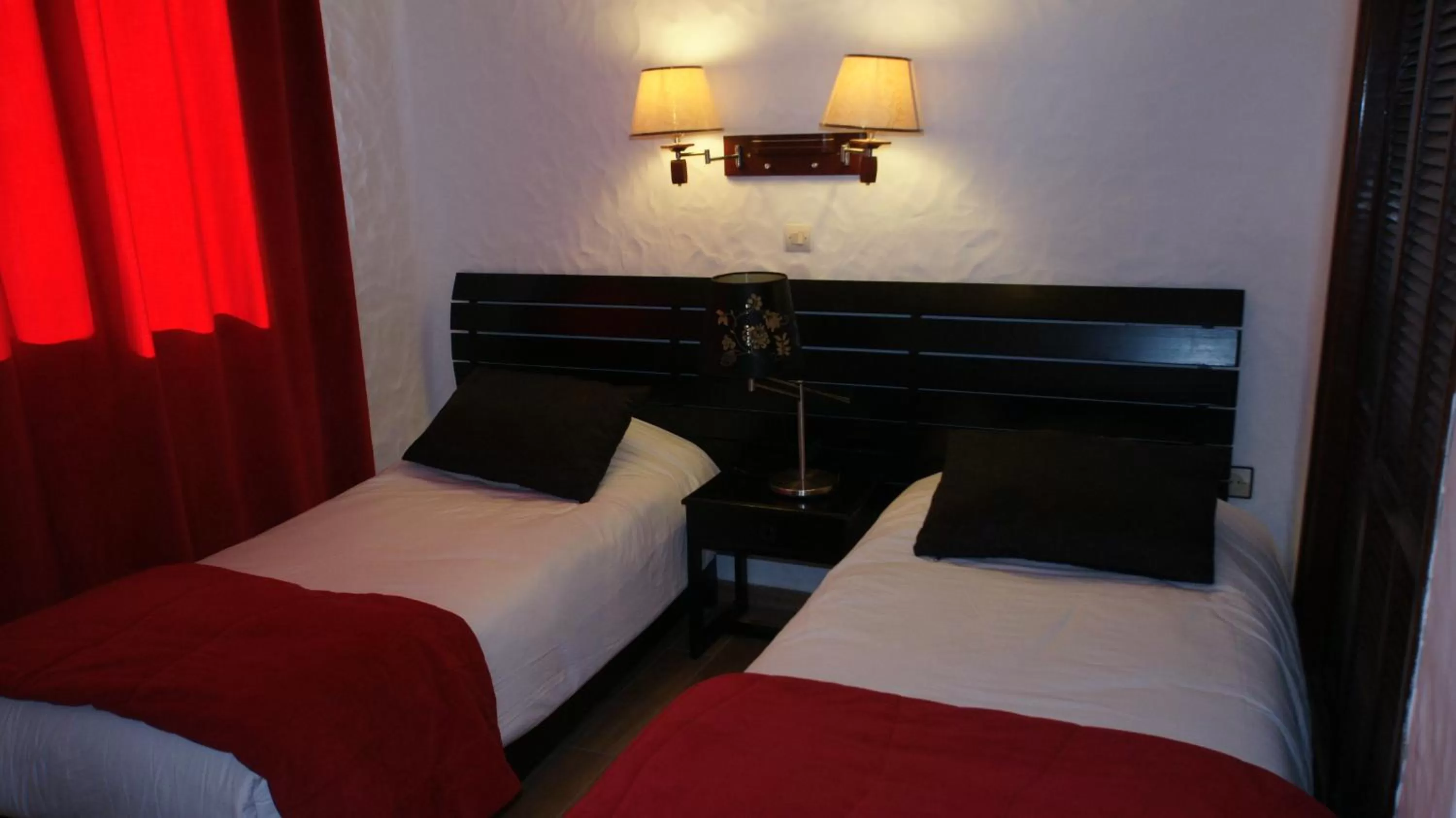 Bed in Hotel Hacienda