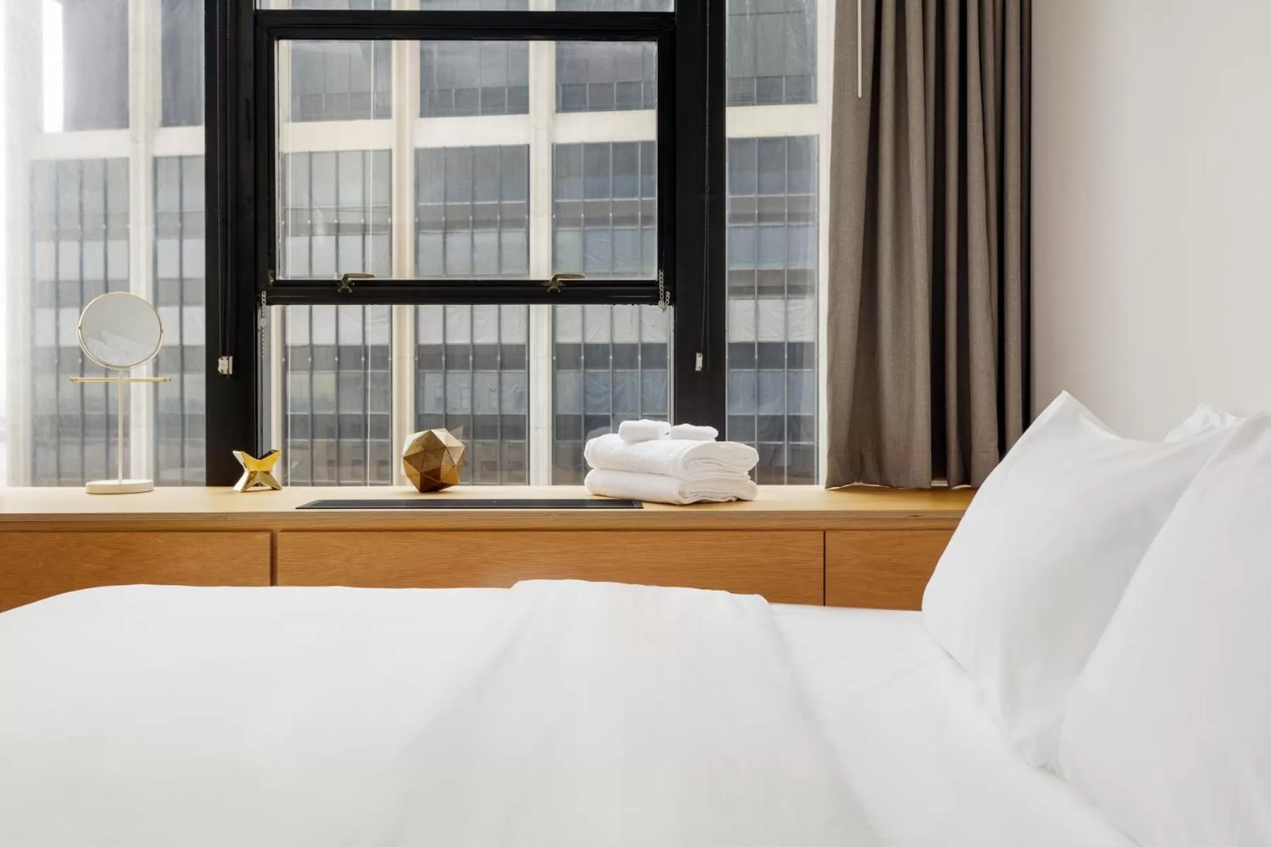 Bed in Placemakr Wall Street