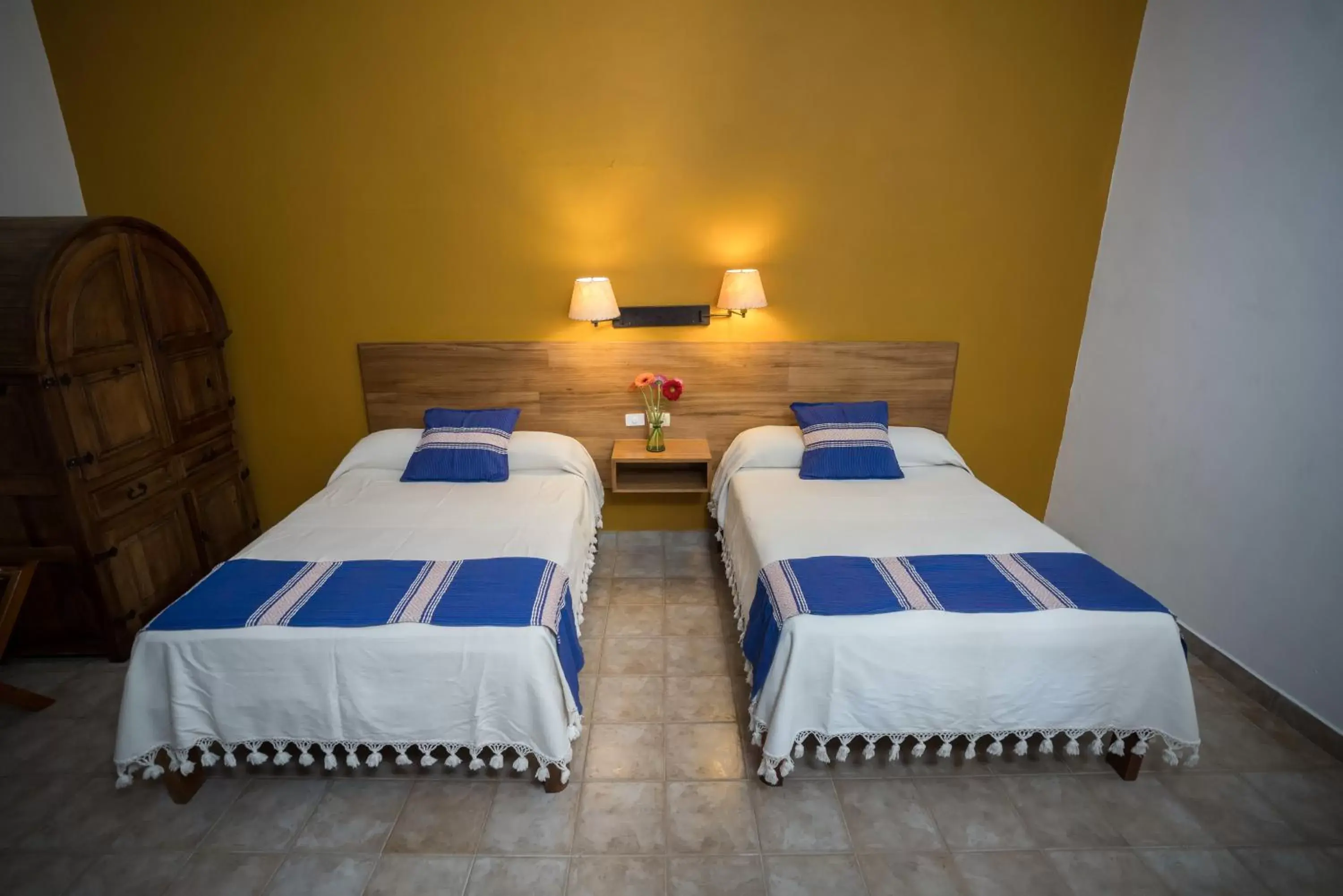 Bed in Parador San Agustin
