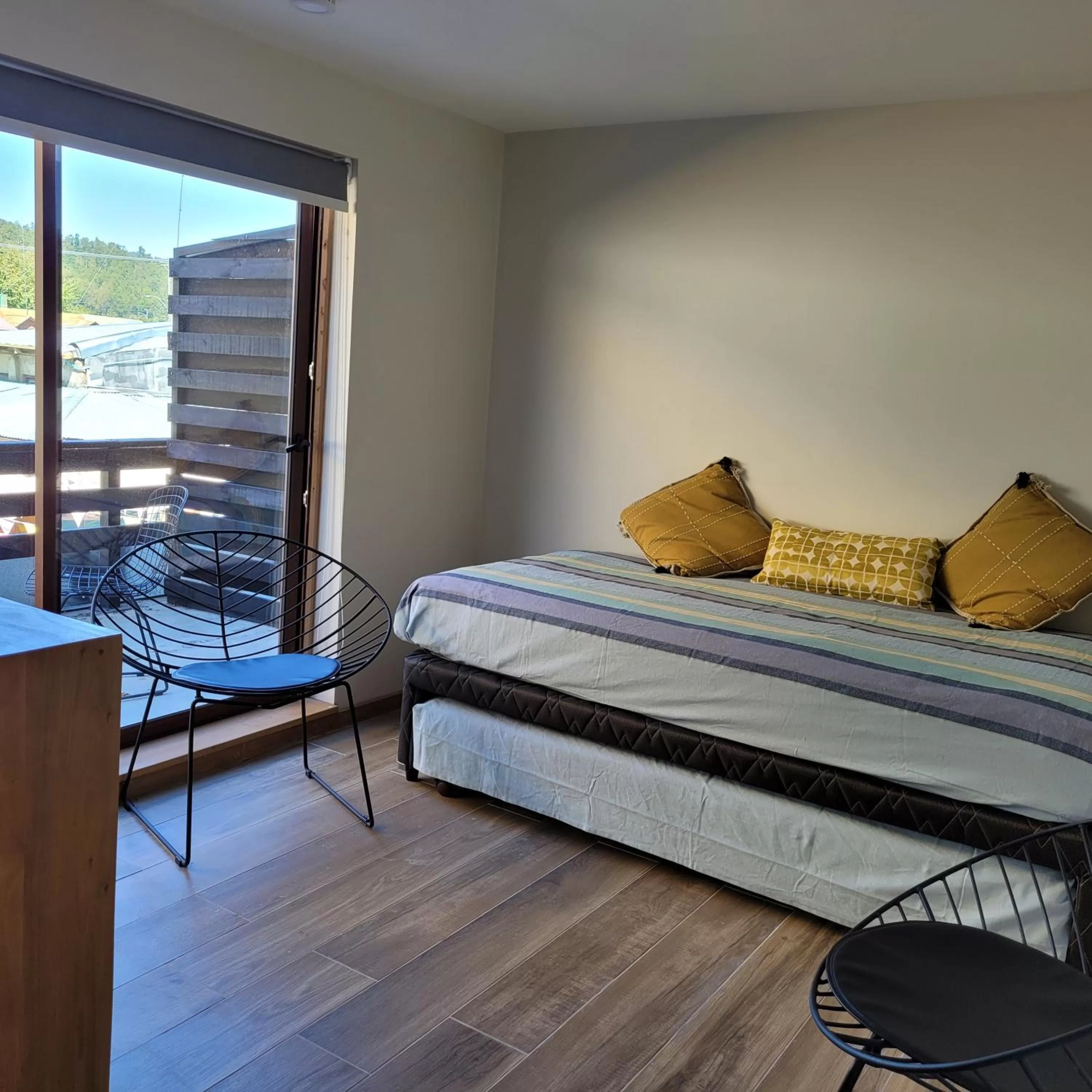 Living room, Bed in Mawün Hotel Pucón