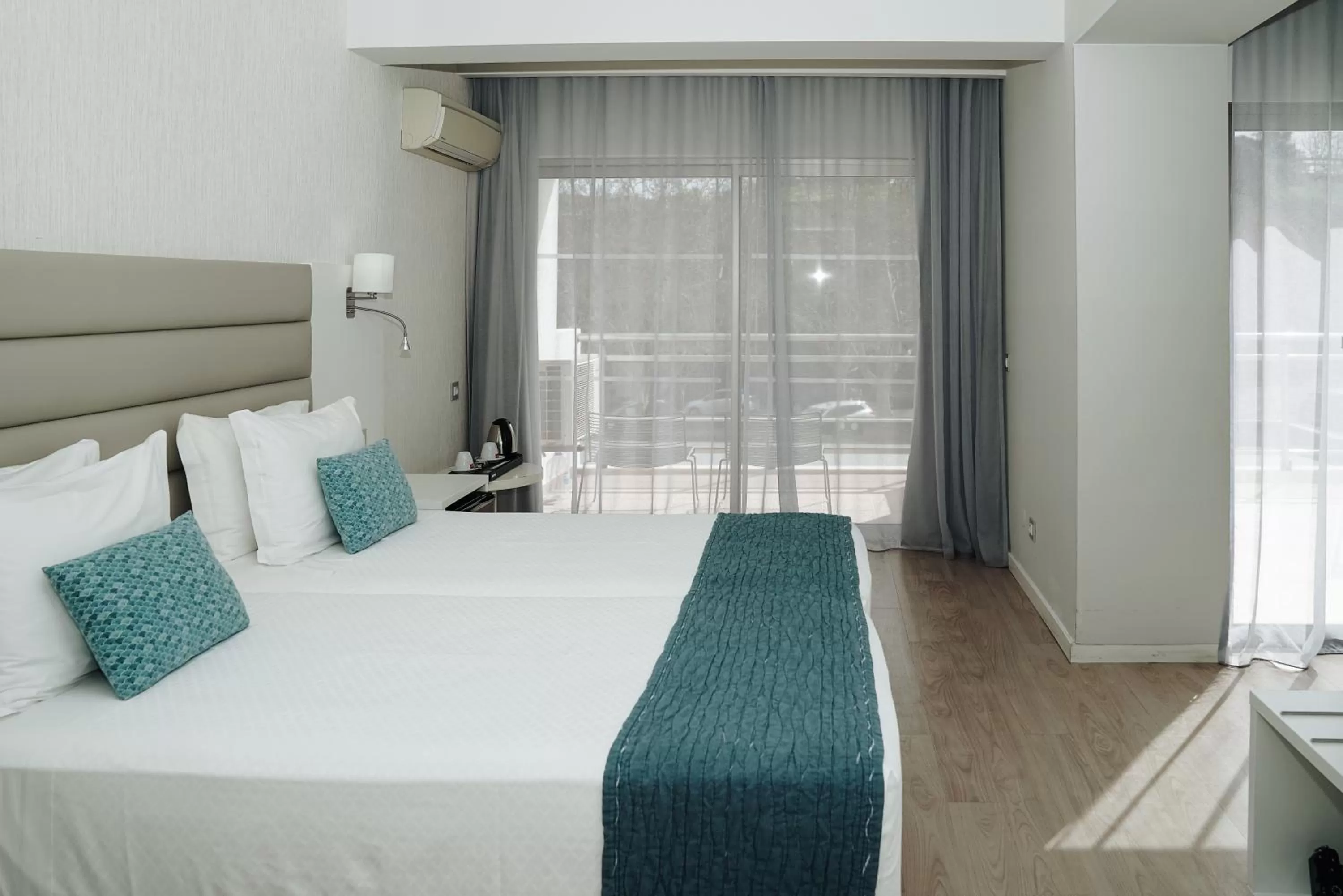 Bed in Carvi Beach Hotel