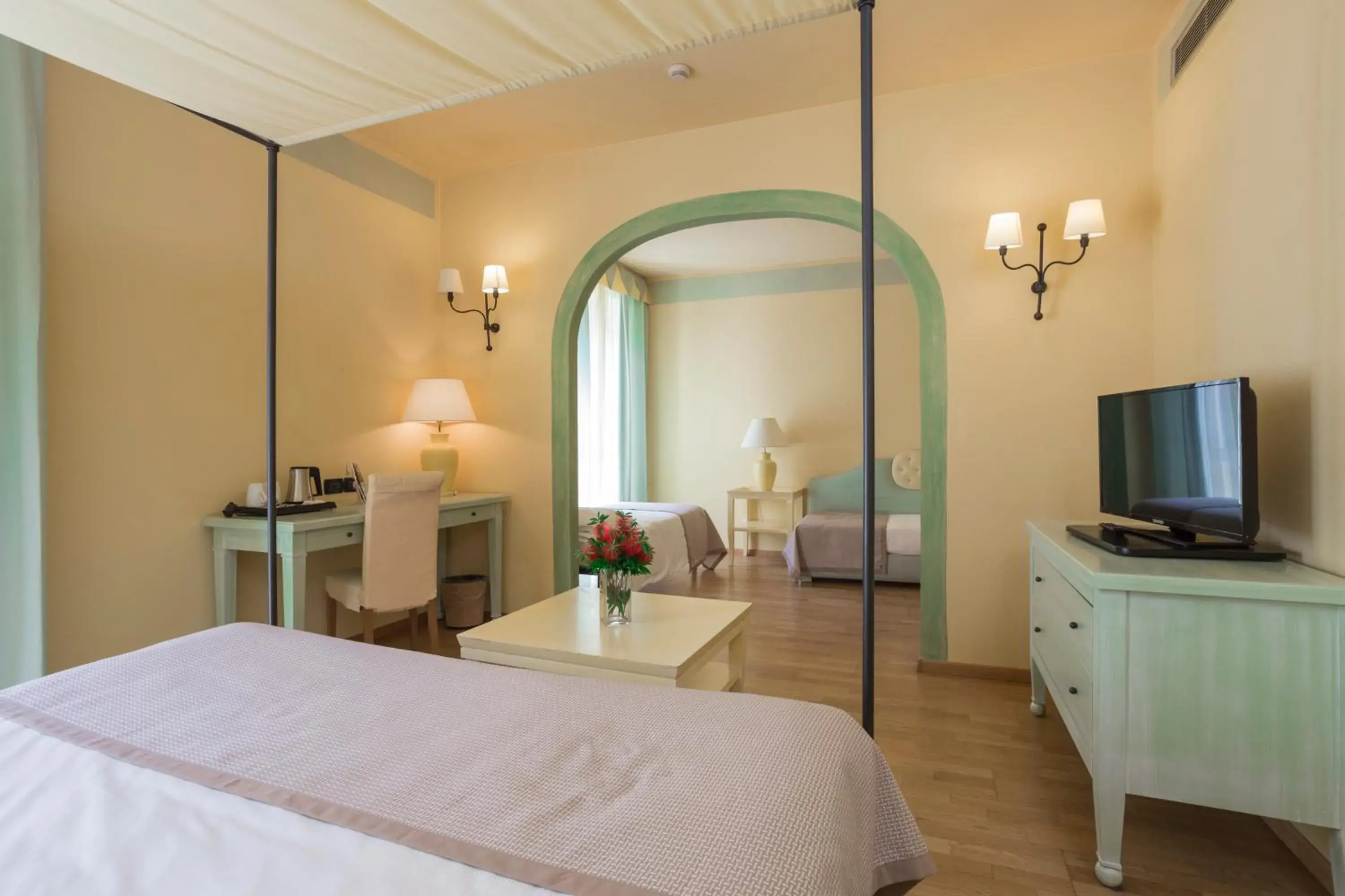 Photo of the whole room, Bed in TH Tirrenia - Green Park Resort