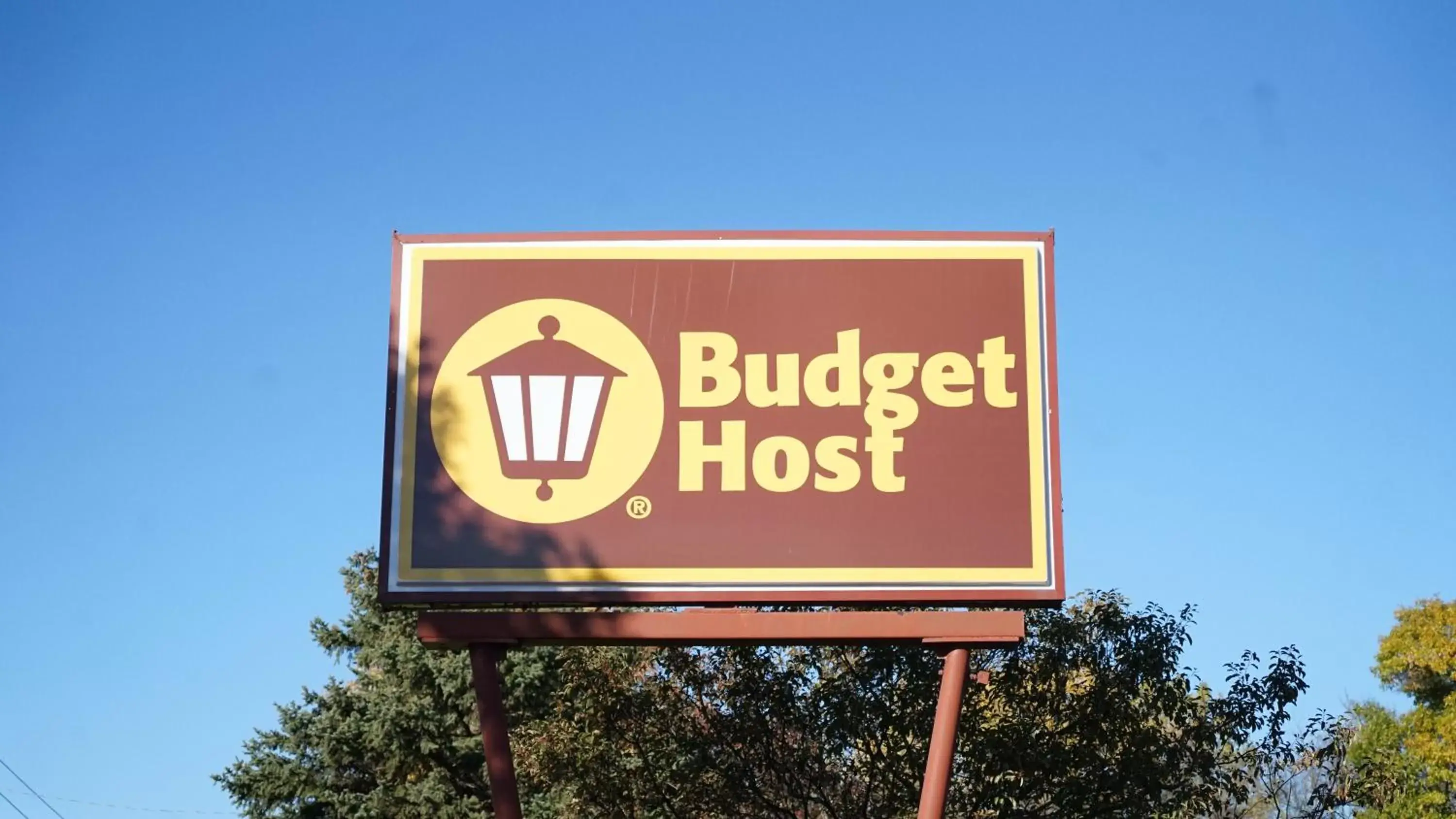 Property logo or sign in Budget Host Inn Fridley