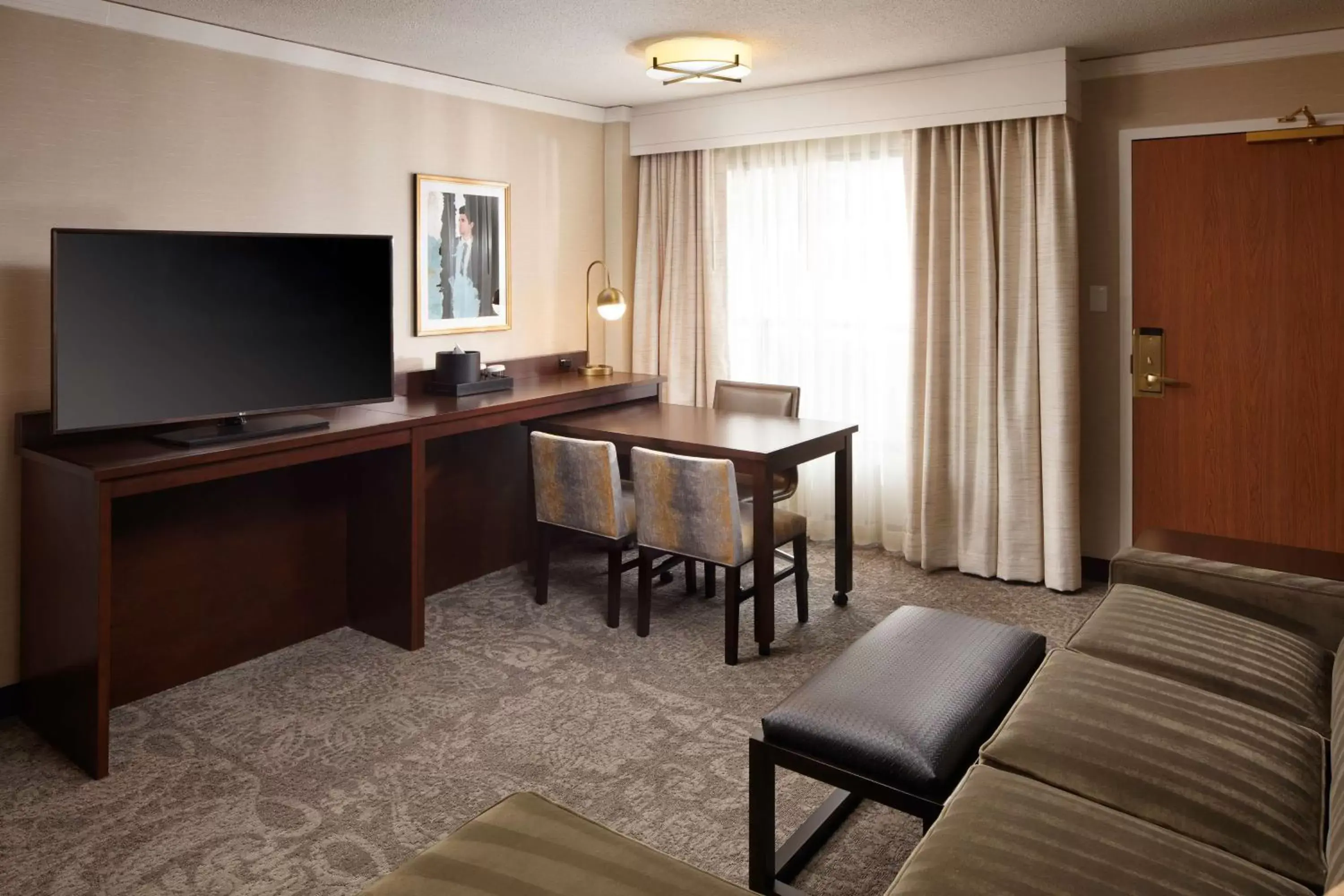 Bedroom, TV/Entertainment Center in Embassy Suites Tysons Corner