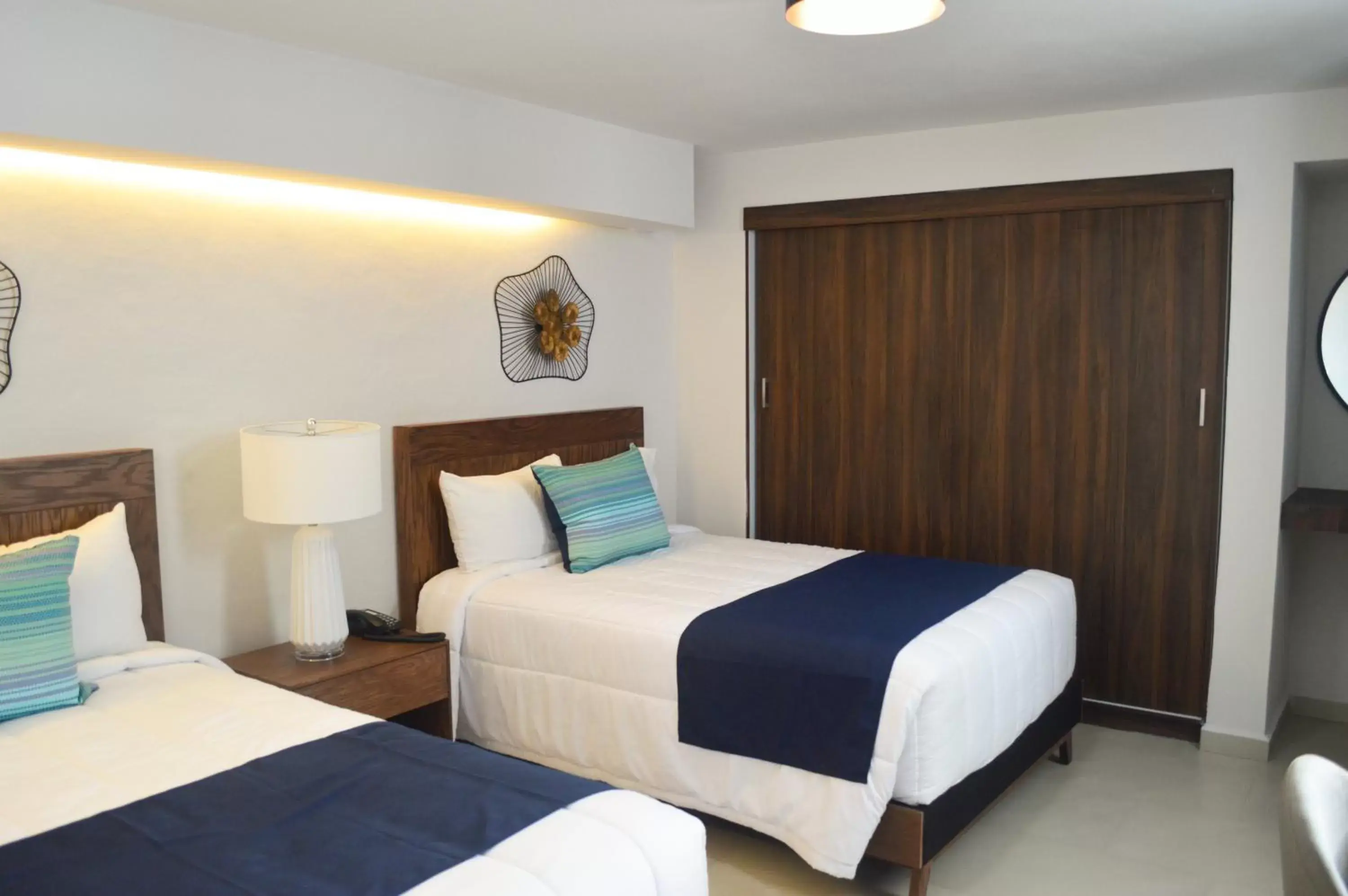 Bed in The Inn at Mazatlan Bed in The Inn at Mazatlan