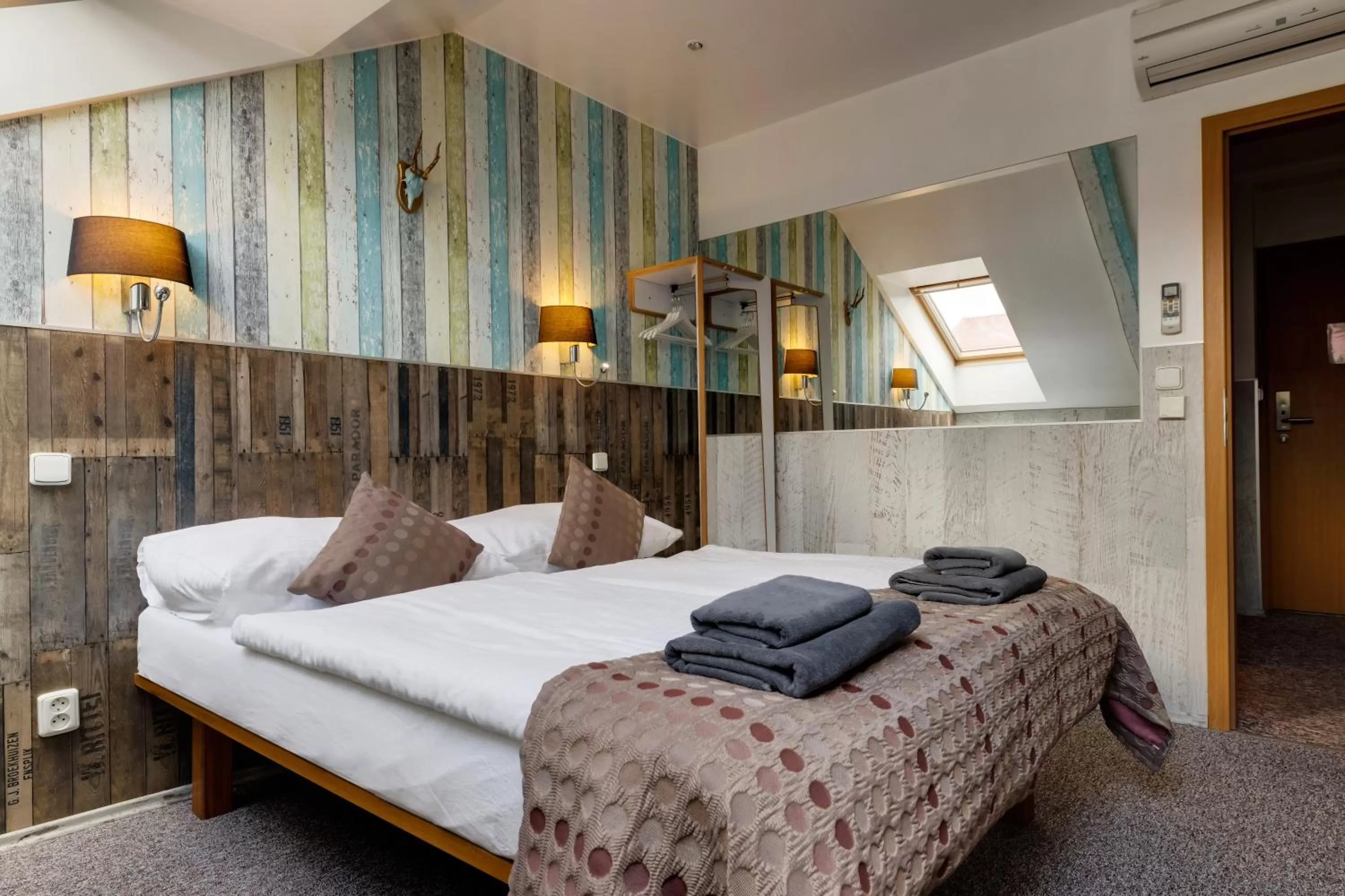 Bed in Royal Court Hotel