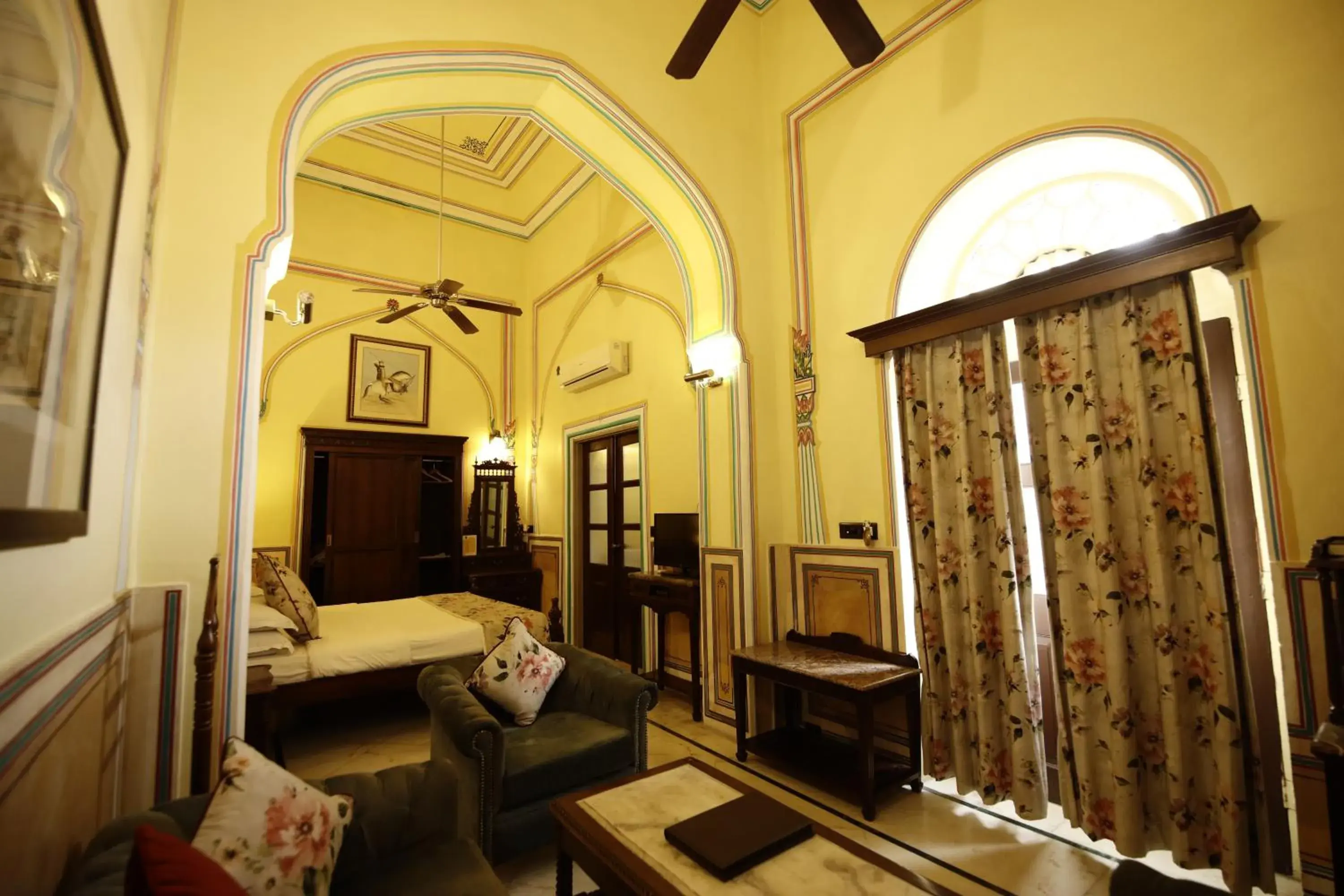 Bed, Seating Area in Hotel Narain Niwas Palace