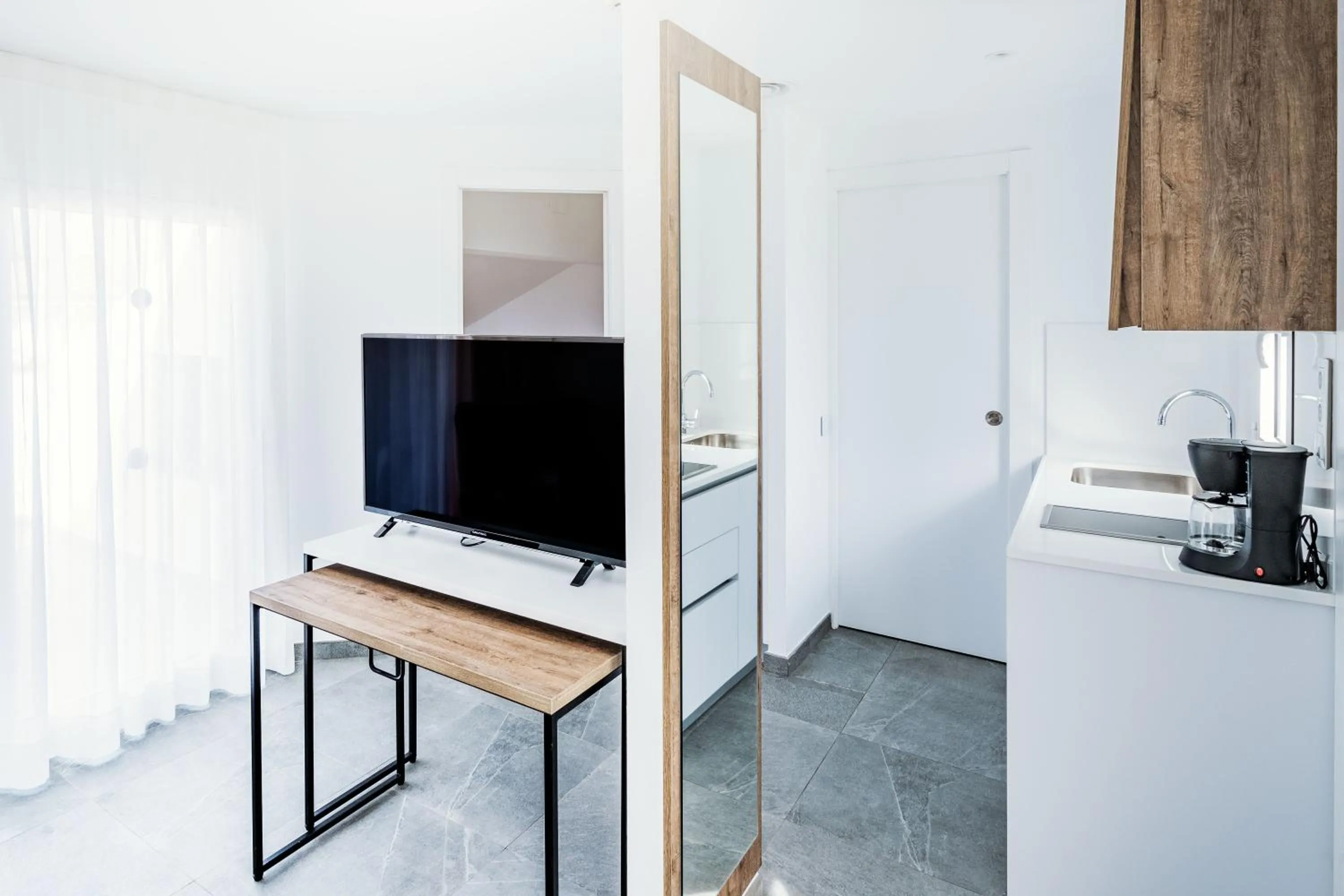 TV and multimedia in Apartamentos Sunway Apollo