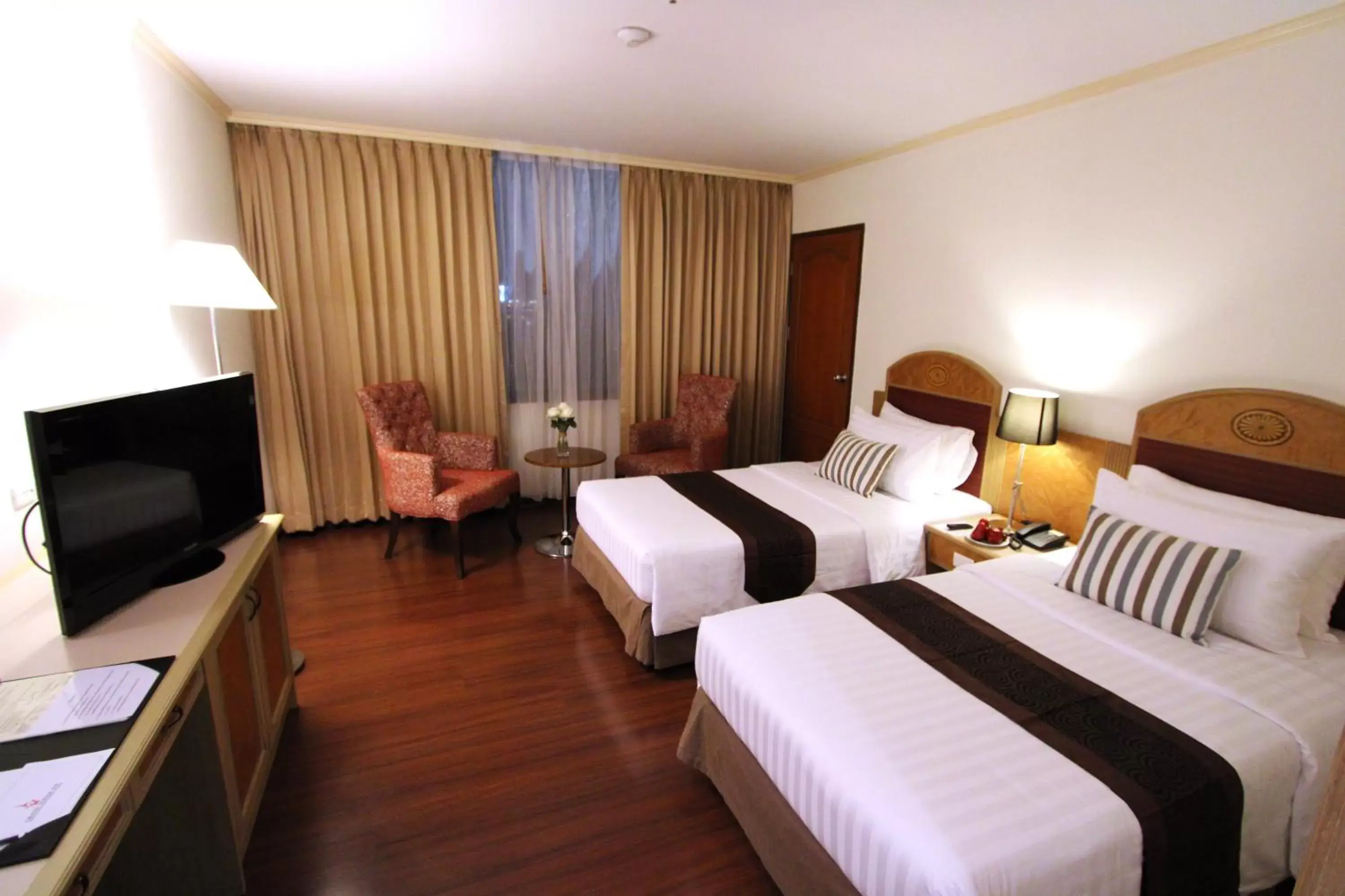 Bedroom in Grand Tower Inn Rama 6 - SHA Extra Plus