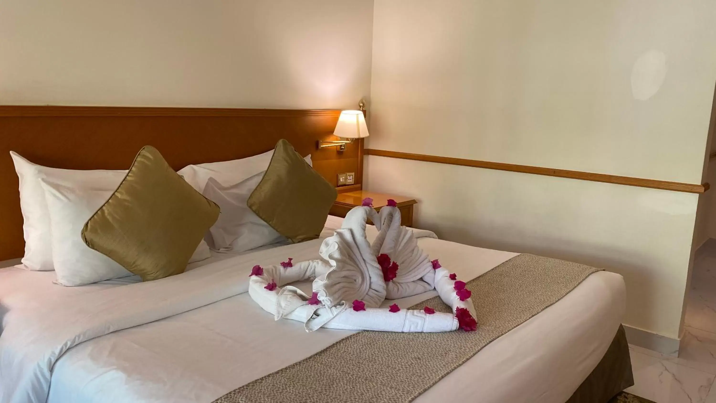 Bed in Golden Tulip Nizwa Hotel