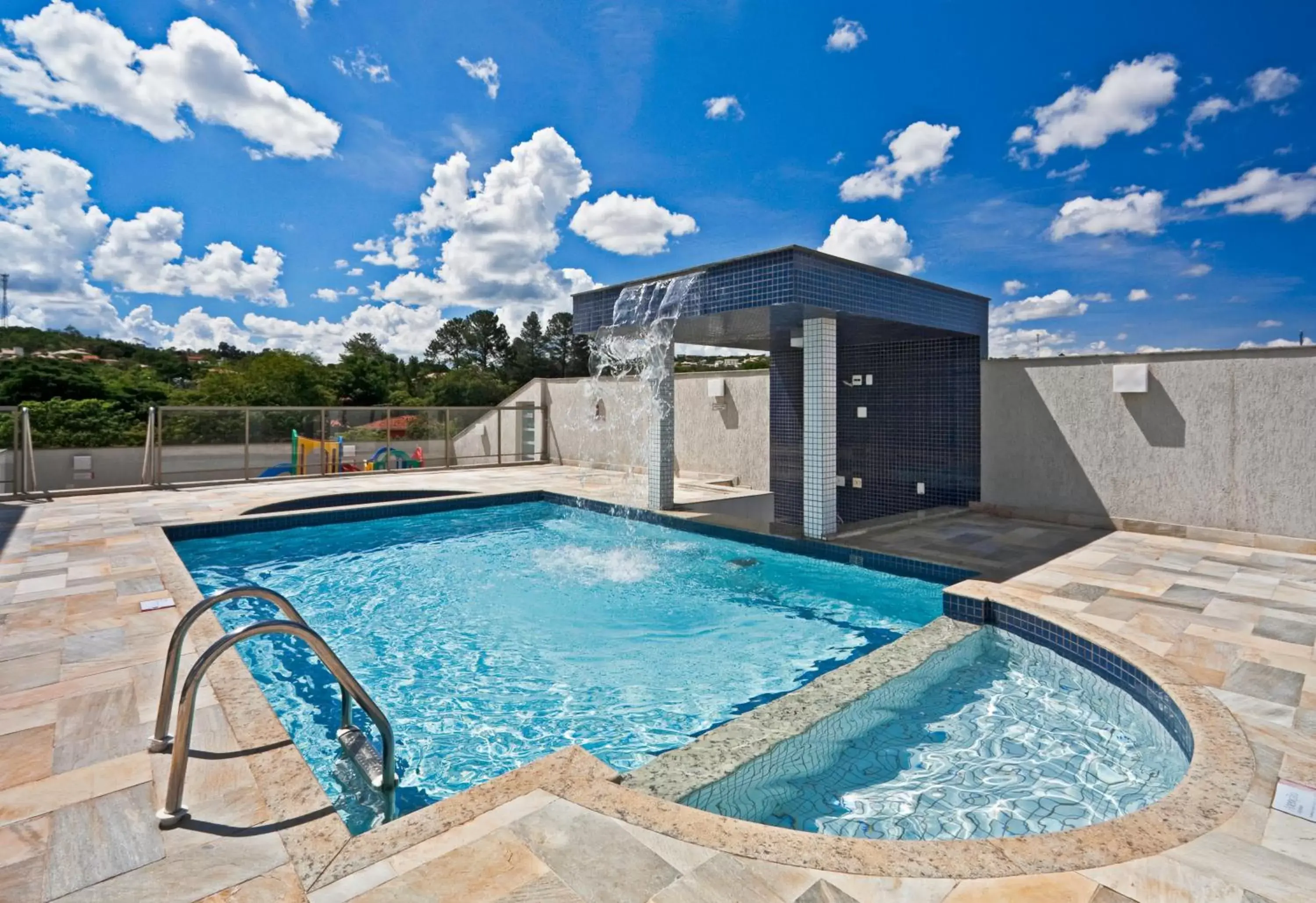 Swimming Pool in Ramada Hotel & Suites Lagoa Santa By Wyndham