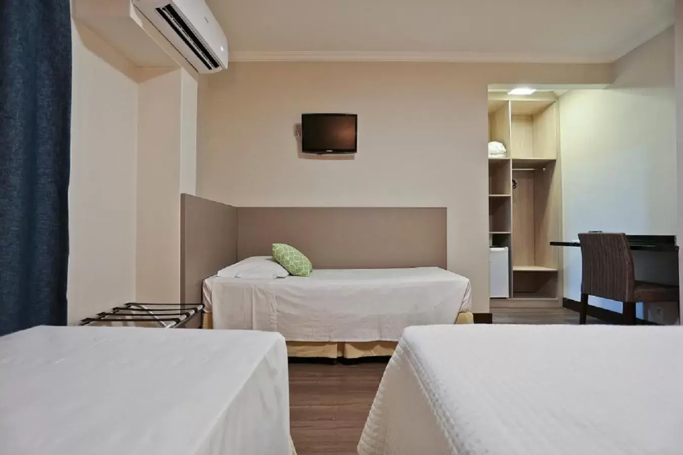 Bed in Sandri City Hotel