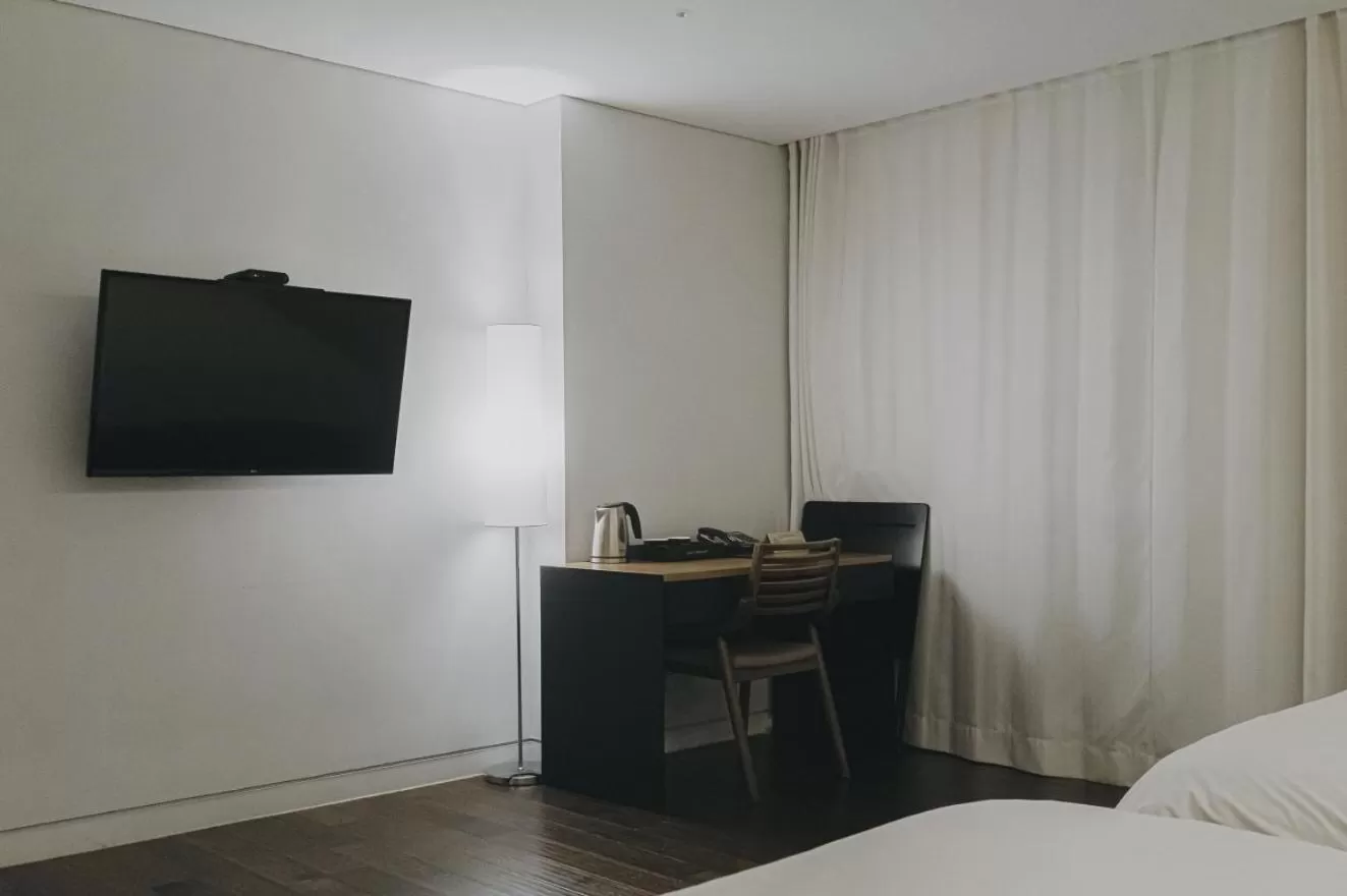 Bed in ACC Design Hotel