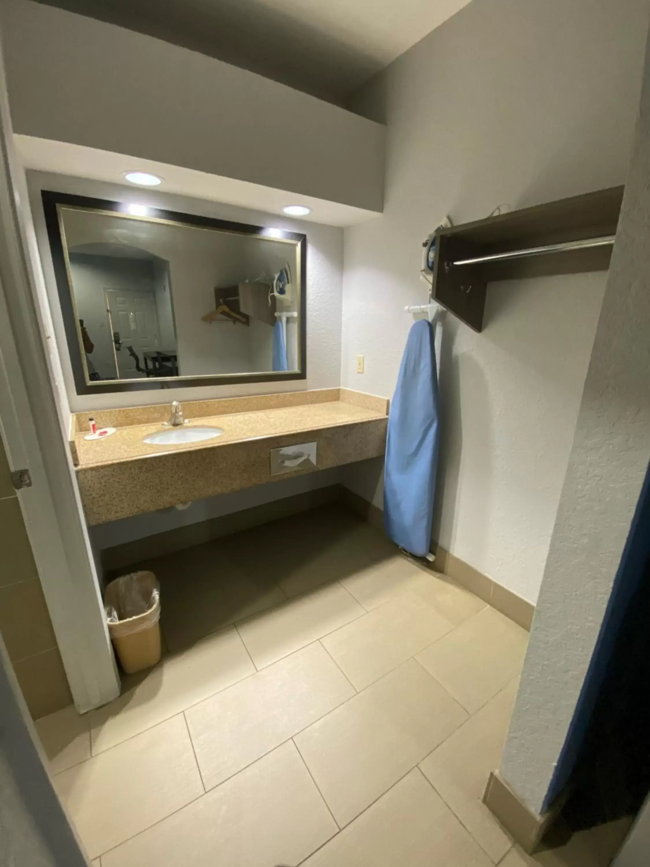 Bathroom in Super 8 by Wyndham Houston Hobby Airport South