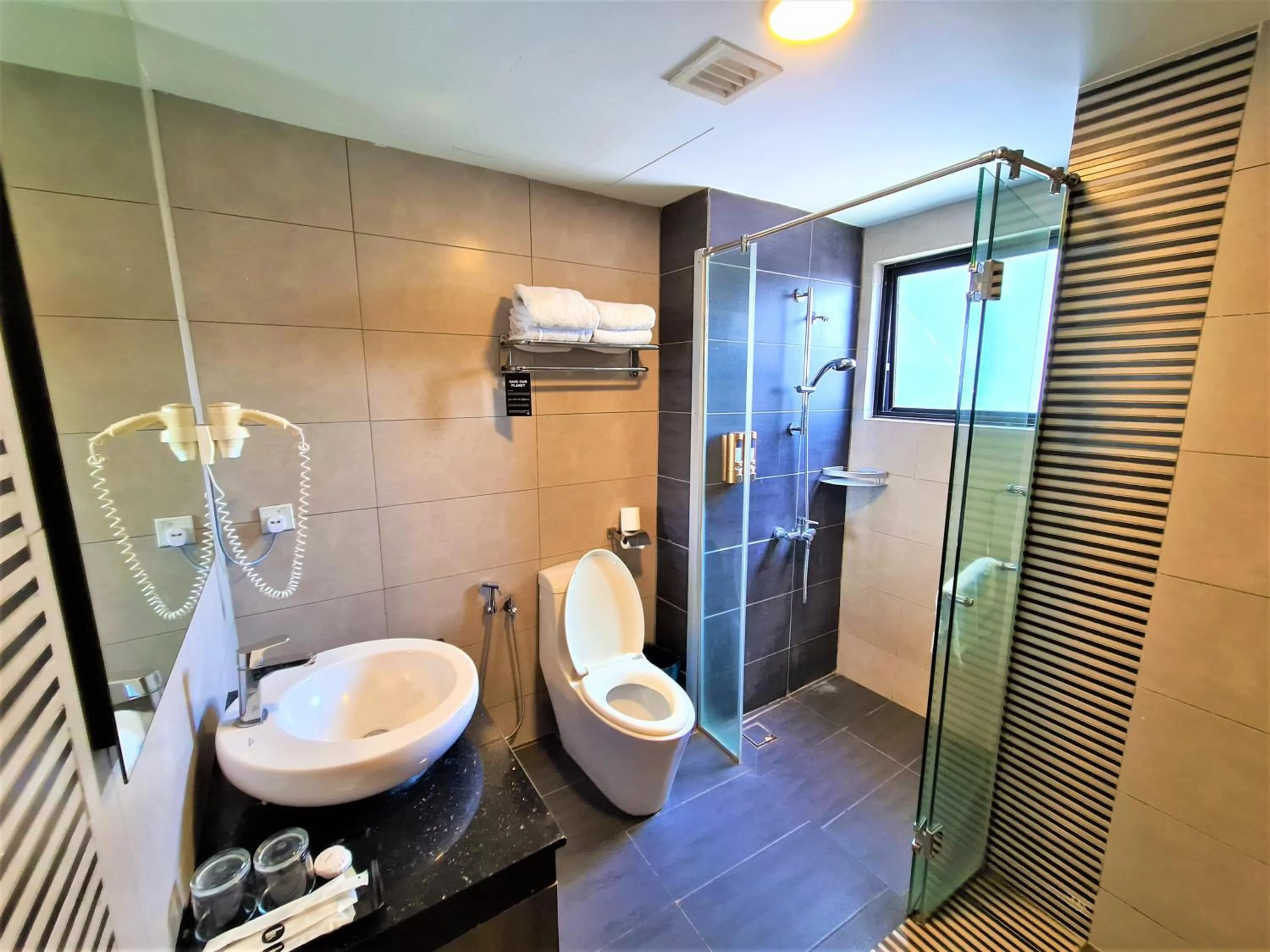 Toilet in Nexus Regency Suites & Hotel