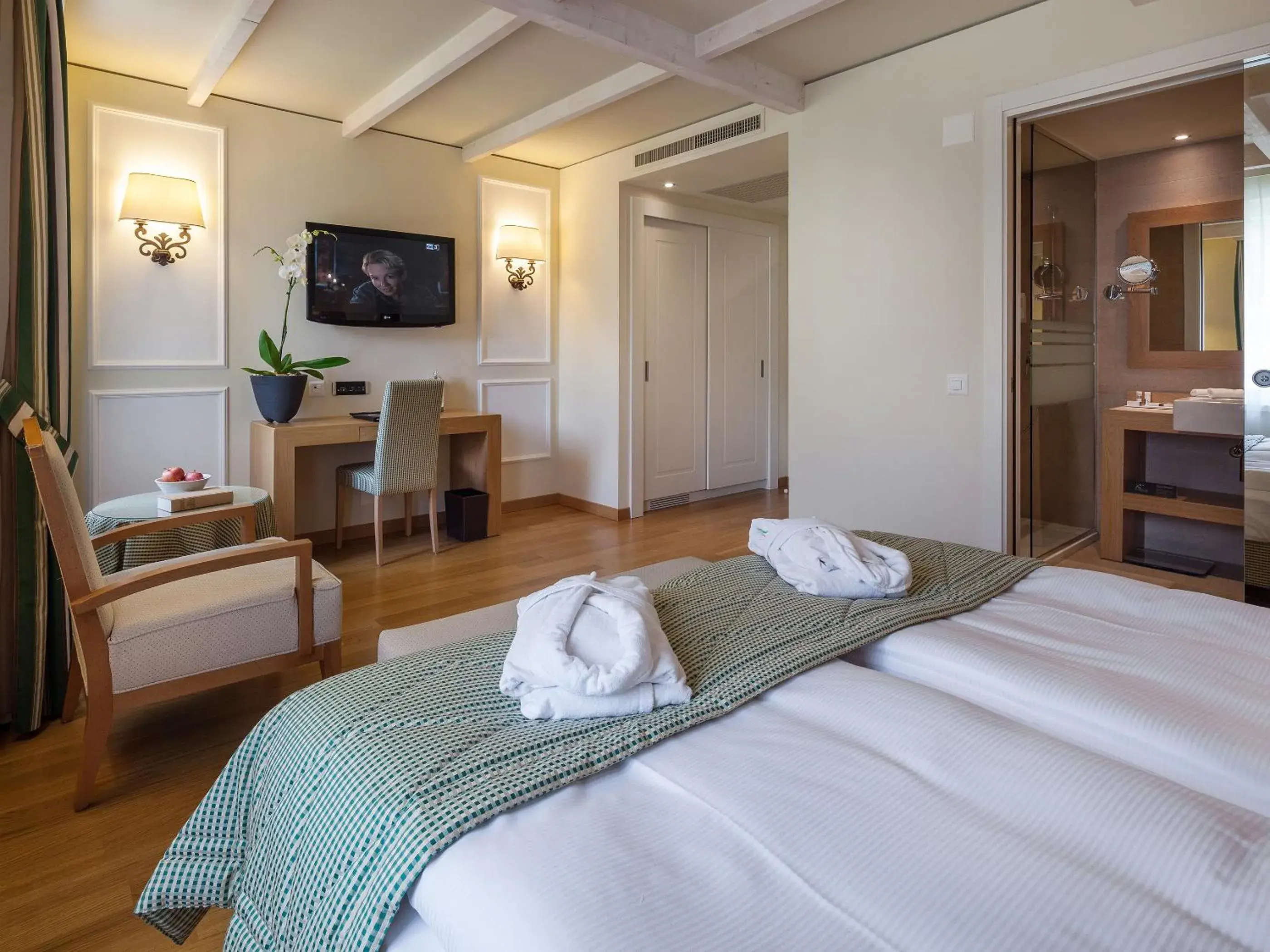Bedroom, TV/Entertainment Center in Kurhaus Cademario Hotel & DOT Spa - Ticino Hotels Group