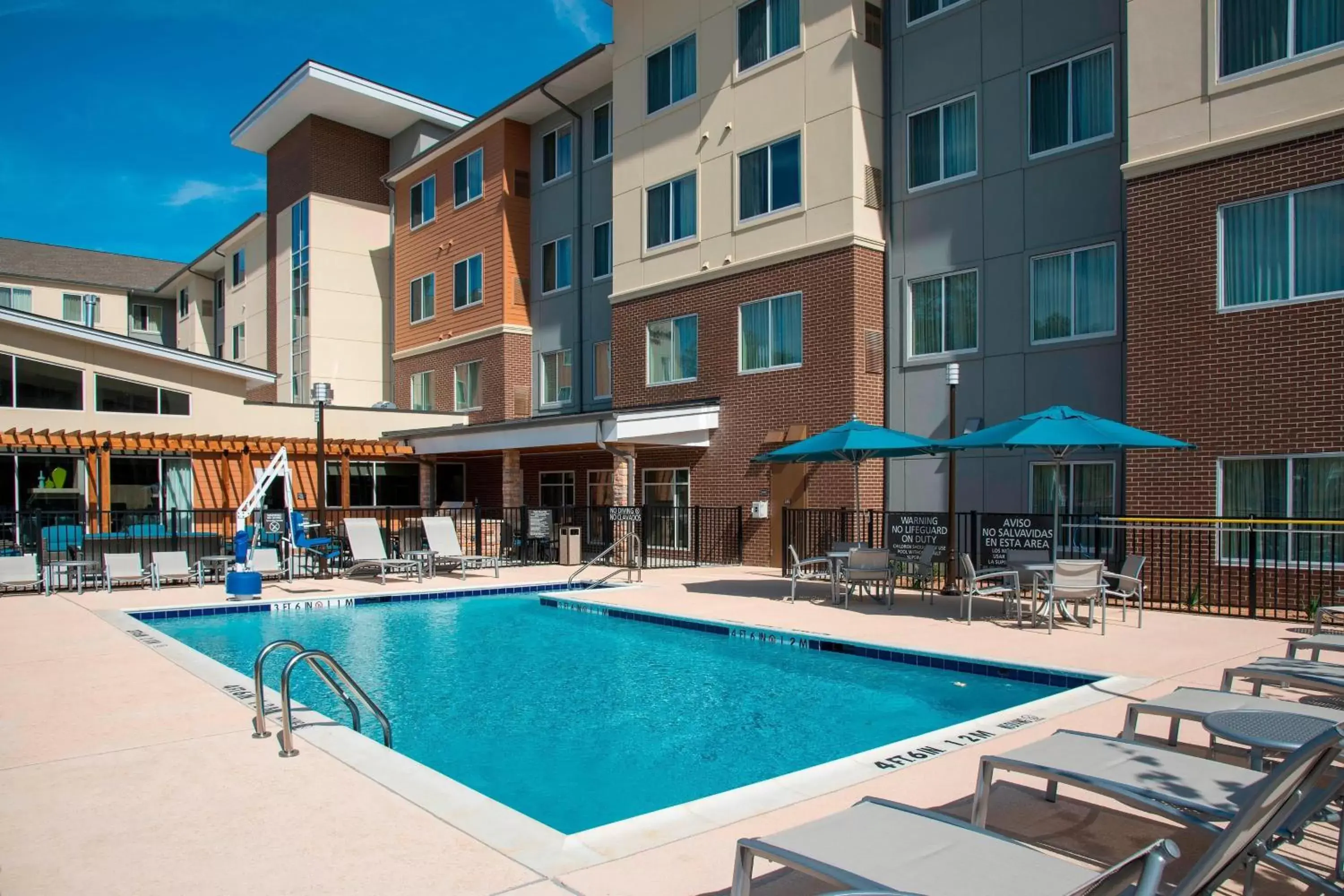 Swimming pool, Property Building in Residence Inn by Marriott Houston Springwoods Village