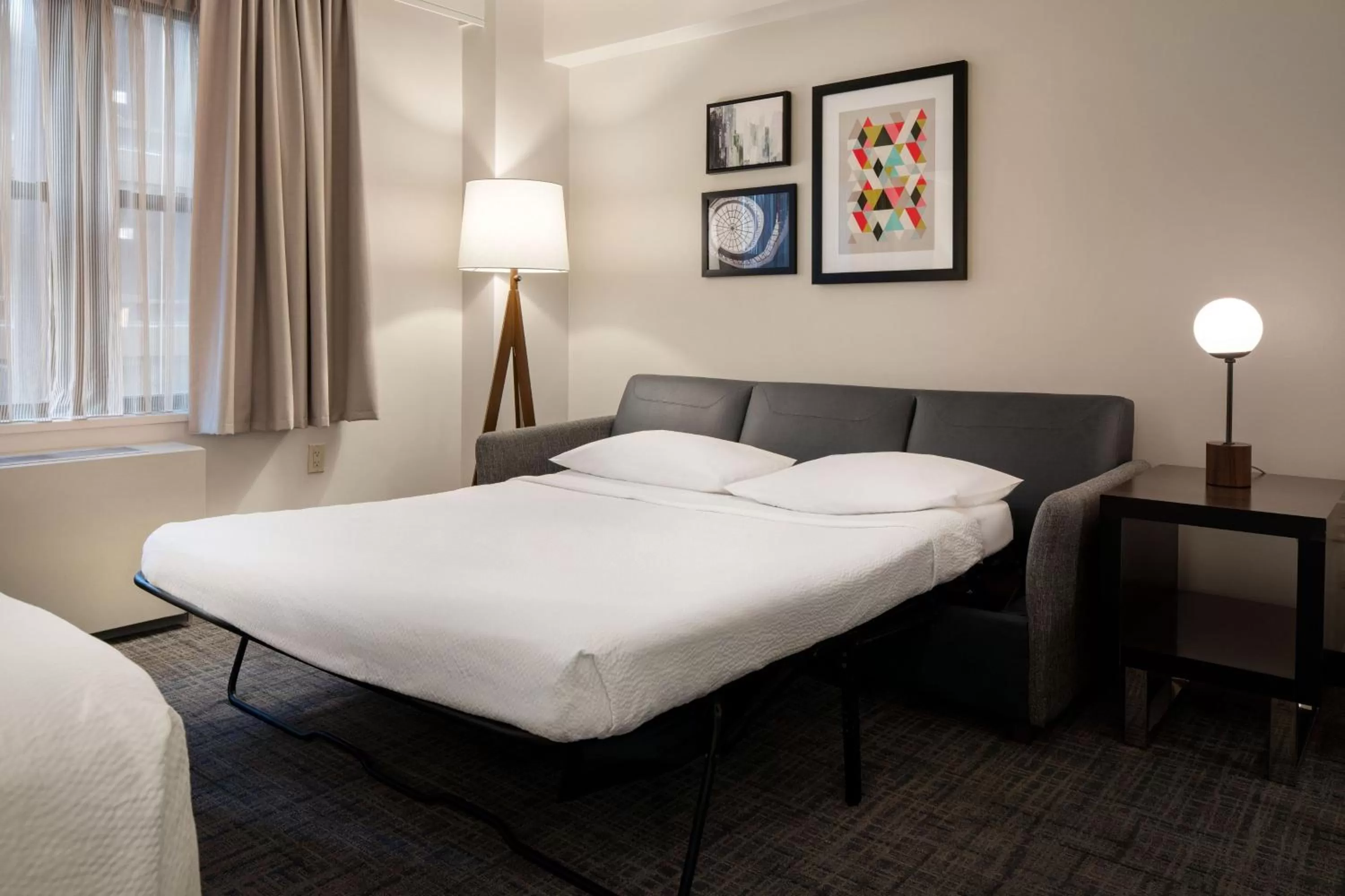 Photo of the whole room, Bed in Residence Inn by Marriott New York Manhattan/ Midtown Eastside