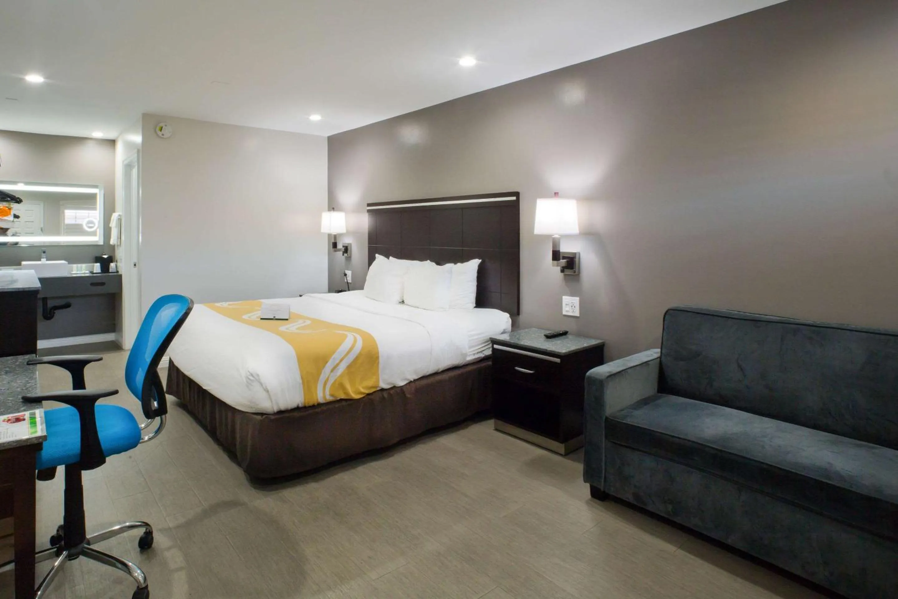 Photo of the whole room, Bed in Bay Area Inn & Suites